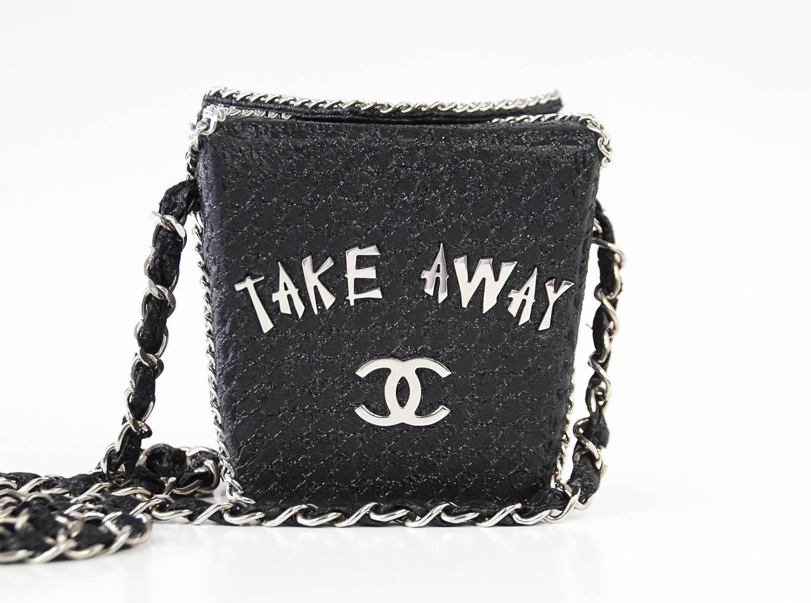 Guaranteed authentic CHANEL very rare Take Away Box bag from the coveted Chanel Shanghai collection.
Metallic fabric finished with classic leather and silver signature chain.
Inspired by Chinese take-away boxes.
Interior has silver logo plaque and