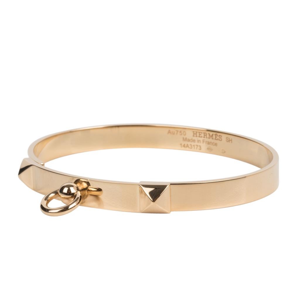 The chic and instantly recognizable Hermes CDC Collier de Chien bracelet small model created in 18K Yellow Gold.
Originally created to protect hunting dogs this signature design morphed to belts, cuffs and now to the small model which is perfect for