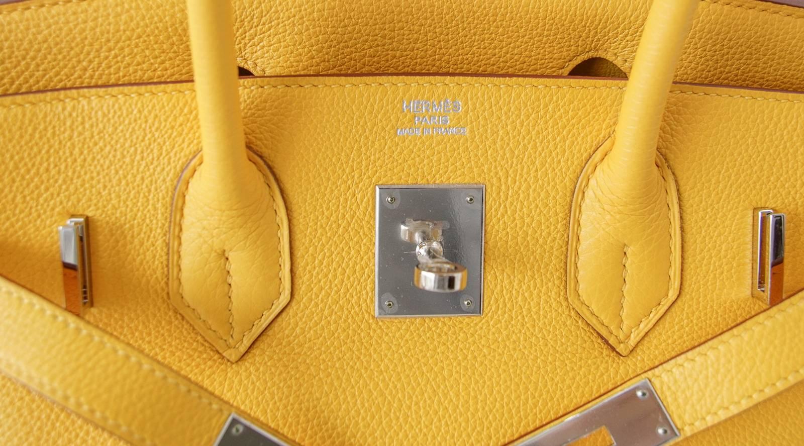 Guaranteed authentic Hermes Birkin 30 bag in rare Soleil - sunny yellow perfection!.
Fresh with Palladium hardware and togo leather.
Plastic on hardware.
Comes with the lock and keys in the clochette, signature Hermes box, sleeper and raincoat.
NEW