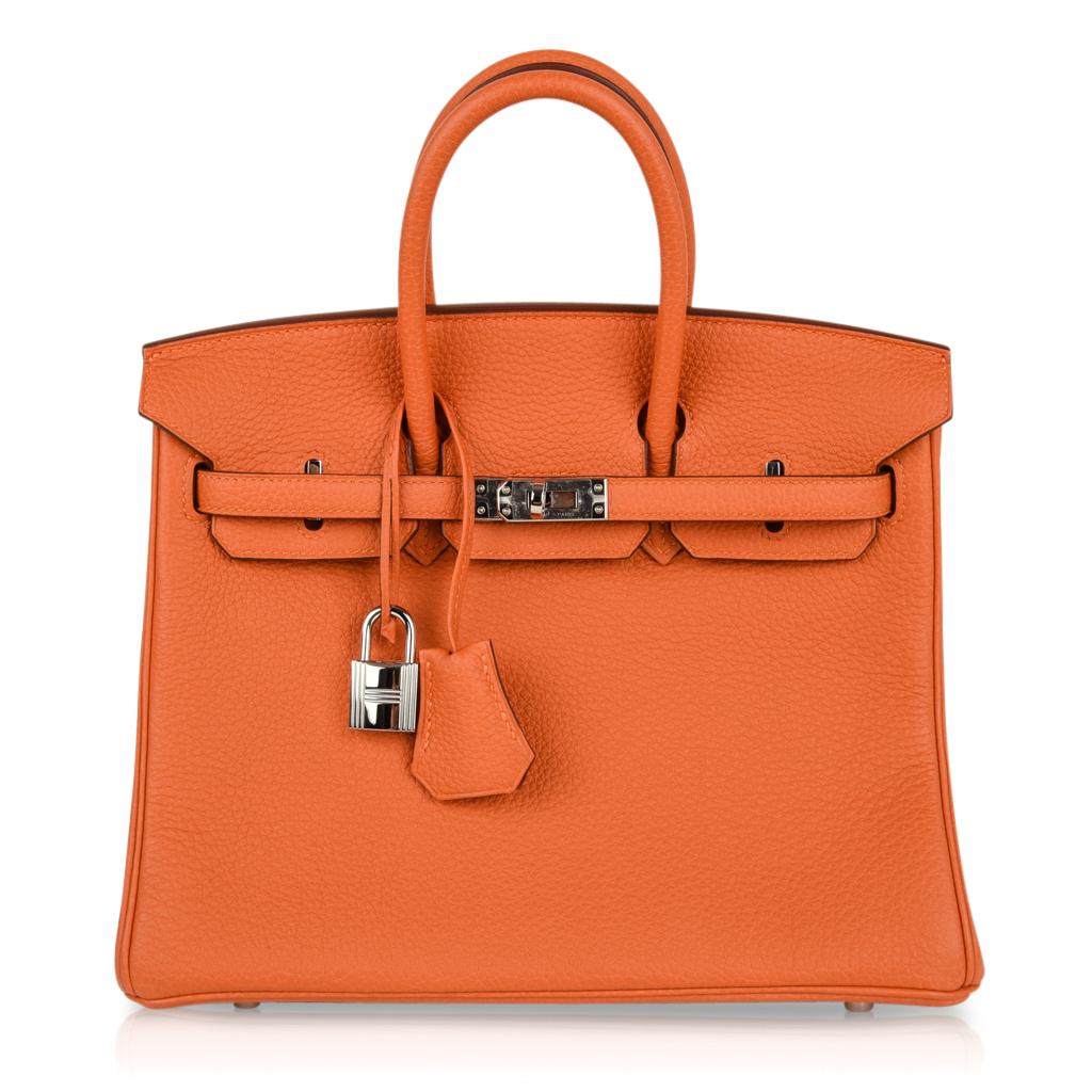 Guaranteed authentic Hermes Birkin 25 bag classic H Orange accentuated with fresh Palladium hardware.
This quench of colour is retired at this time and is one of the signature colours.
Comes with lock, keys, clochette, sleepers, raincoat and