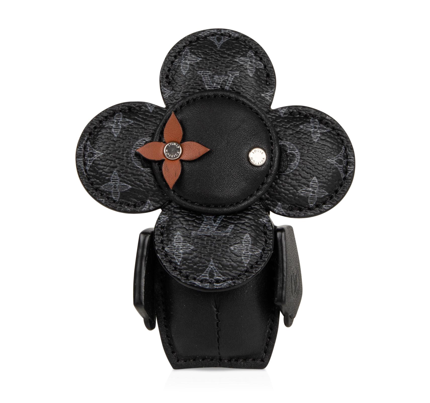 Guaranteed authentic rare Louis Vuitton mascot created from Monogram Eclipse canvas and calf leather.
Charming face with flower eye.
Ruthenium finished brass with signature stamps.
Comes with Louis Vuitton sleeper and box.
NEW or NEVER
