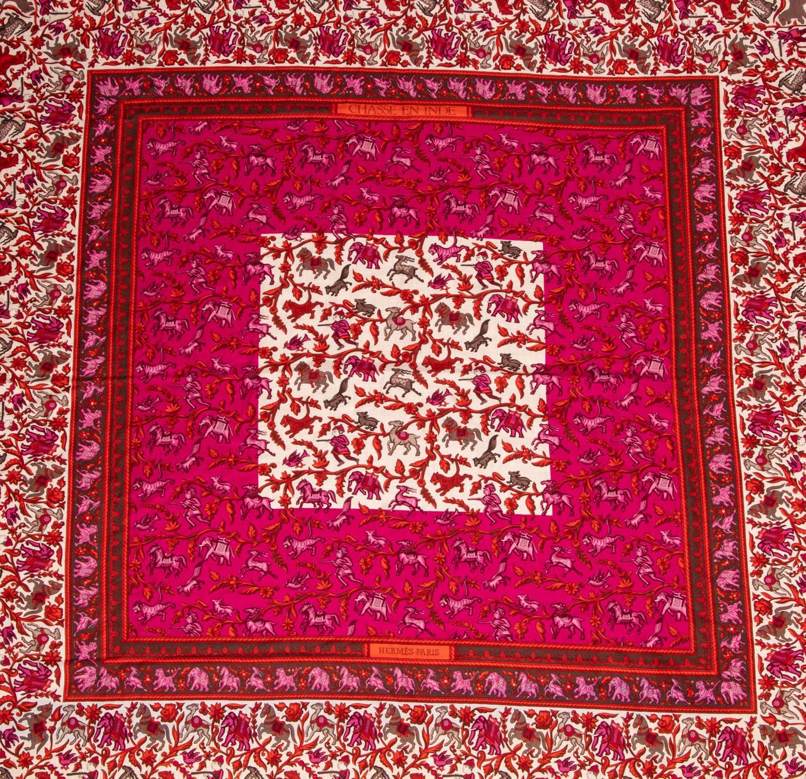 Guaranteed authentic Hermes vintage GM shawl 140cm in the coveted rare Chasse De Indie print.
Highly collectible print large cashmere and silk shawl.
In shades of fuchsia, reds, taupe and beige.
Extremely intricate resplendent with elephants,
