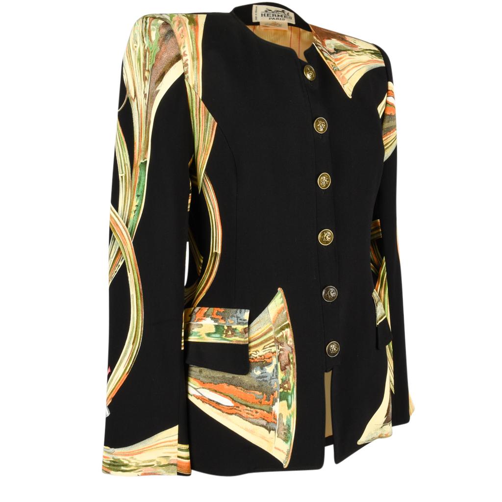 Guaranteed authentic Hermes Trompes De Chasse collectible beautifully shaped military styled scarf print jacket.   
Dramatic with black background with flourishes in gold, green, orange and pink ribbon.
2 front flap pockets.
6 brass buttons embossed