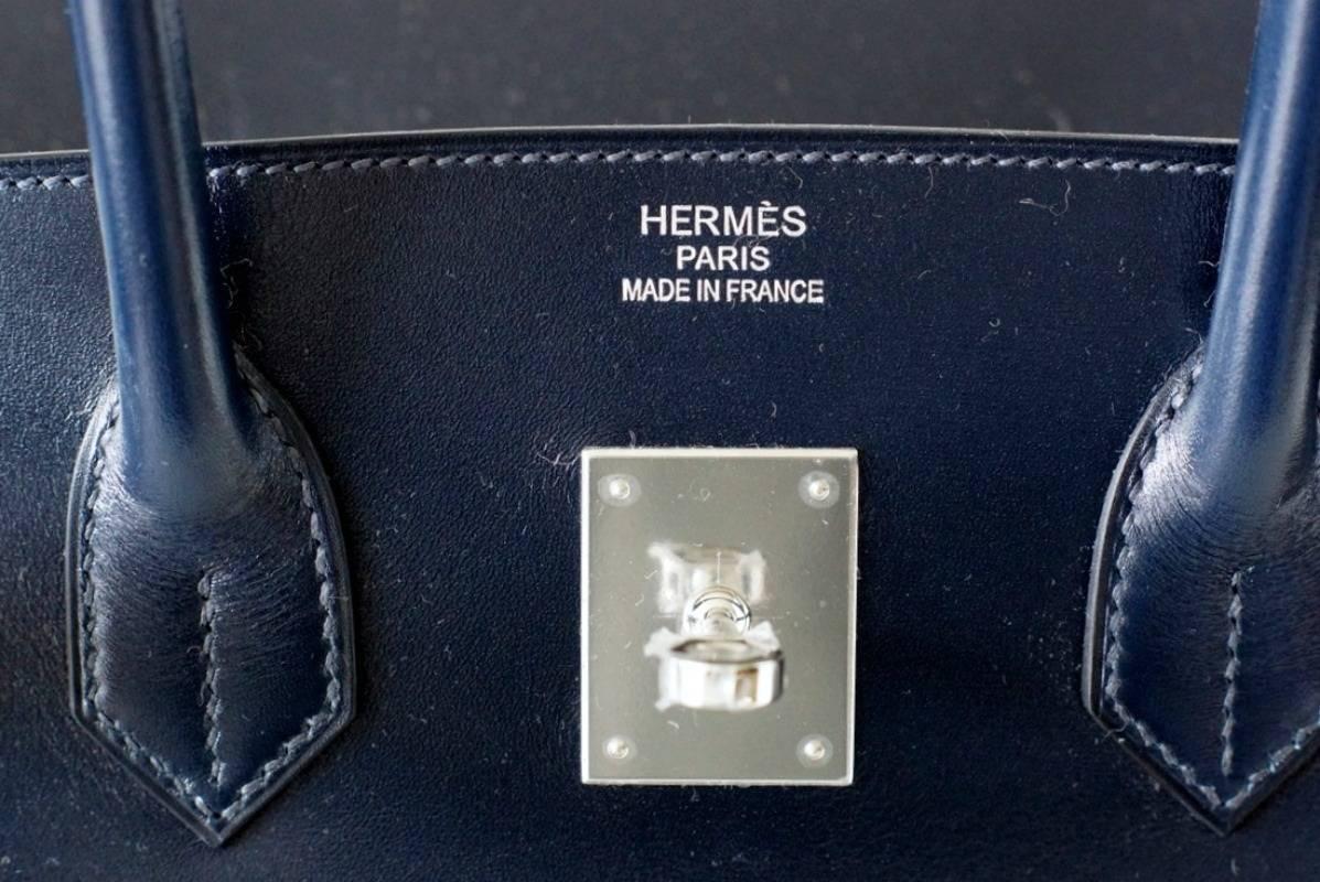 Extremely rare to find coveted box leather. 
BLEU MARINE is rich ocean blue.
Fresh with palladium hardware this beauty is over the top divine and rare!  
NEW or NEVER WORN.  
Comes with lock, keys, clochette, sleeper, signature HERMES box and