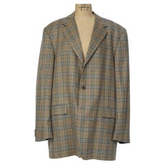 Un blazer Burberry emblématique et intemporel, coupe décontractée à 3 boutons, motif « windowpane »