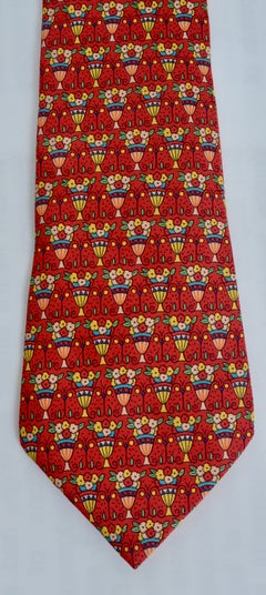 New & Unworn Hermès Paris Mens Red Silk Tie with a Topiary Flower Arrangement