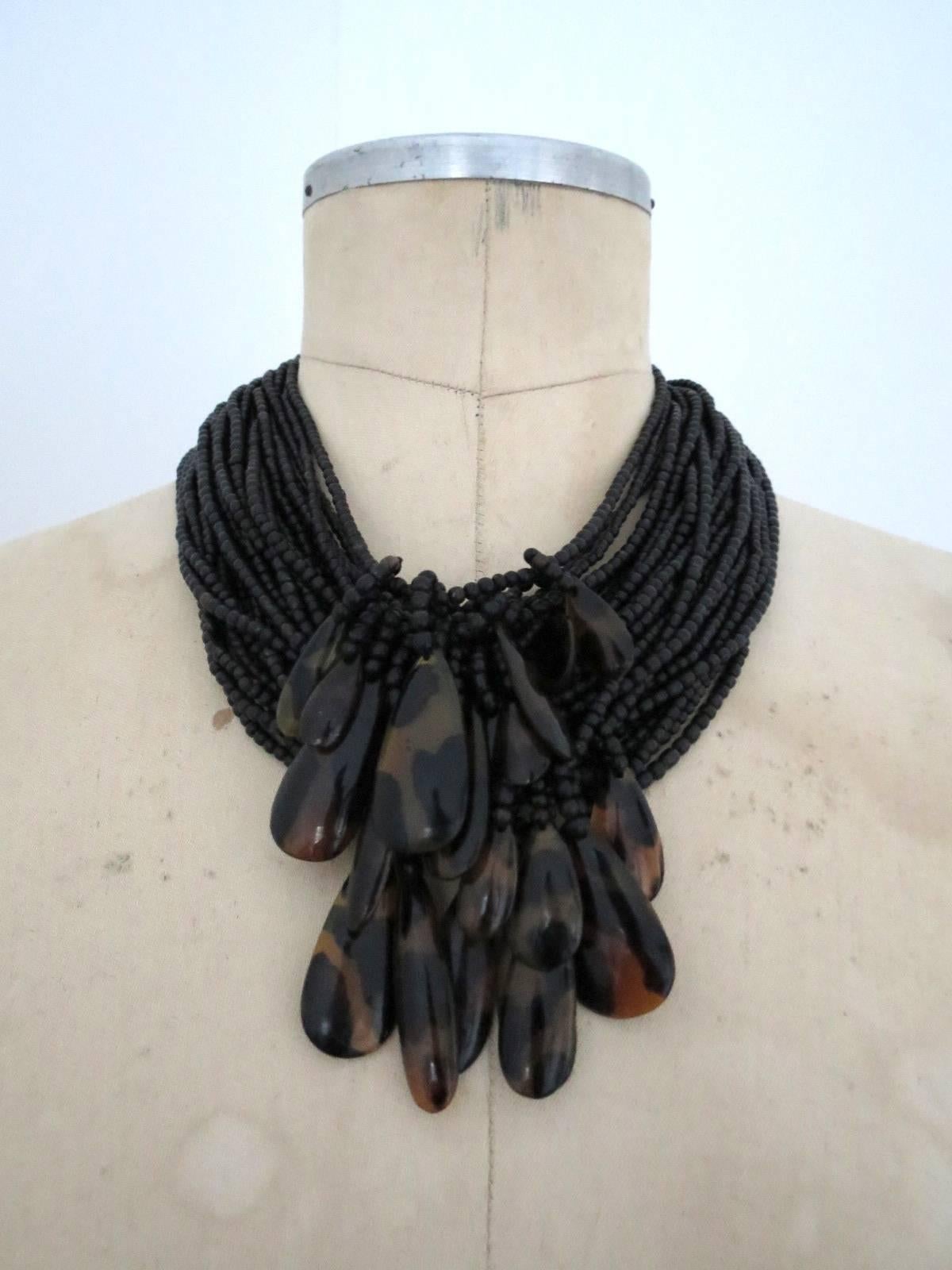 This is lovely Vintage Danish Monies necklace designed by Gerda Lynggaard .
The necklace is made of tortoise shell color horn and it is signed .
Item Specifics
Length: 50cm (approx 19.50