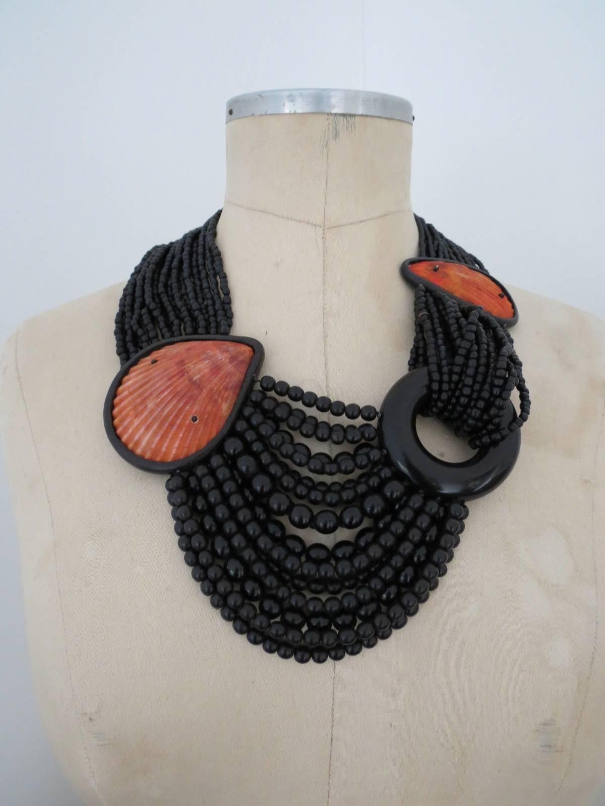 This is lovely Vintage Danish Monies necklace designed by Gerda Lynggaard . The necklace is made of Shell , Horn and Ebony .
Item Specifics
Length: 57cm (approx 22.00