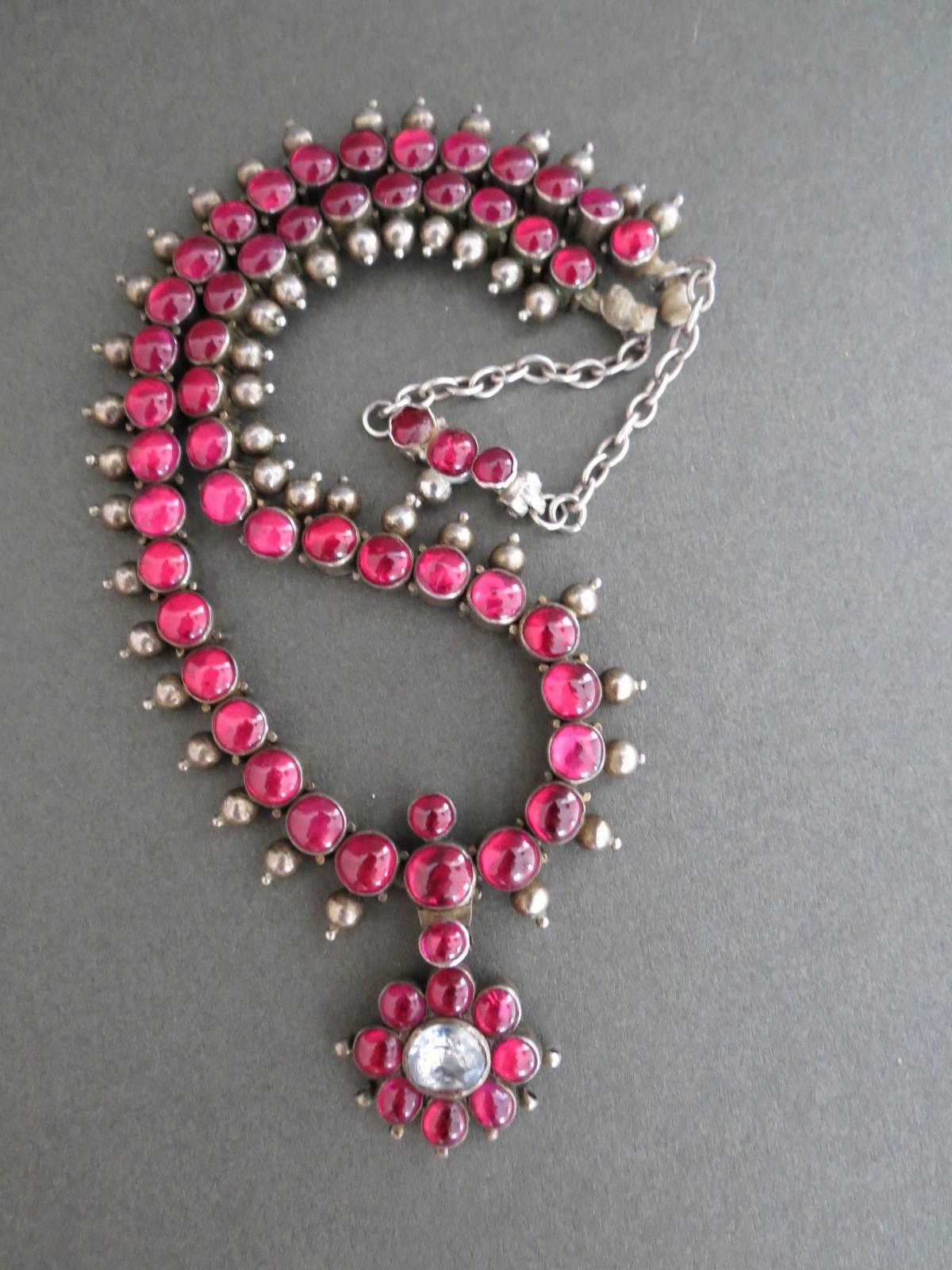 Vintage Indian Wedding Sterling Silver Ruby and Quartz Crystal Necklace. Some age related ware on silver . Silver not hallmarked but tested .
Item Specifics
Length: 42cm (approx 16.50