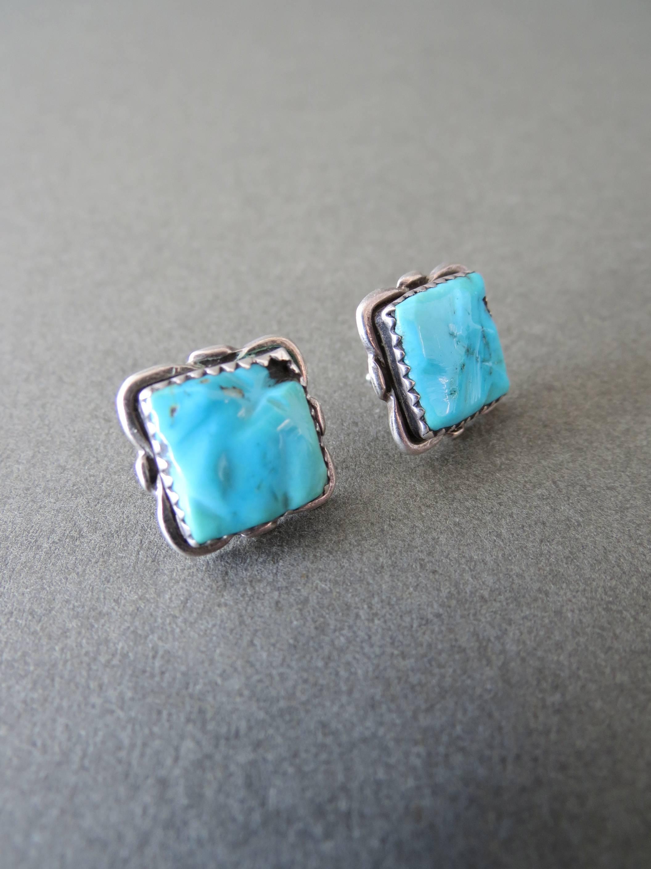 Vintage Navajo Blue Turquoise and Solid Silver Native American Earrings By Alvina Quam Zuni . The earrings are hallmarked and signed .
Alvina Quam's pieces are highly well sought out be Native American collectors.
Item Specifics
Height: 1.8cm