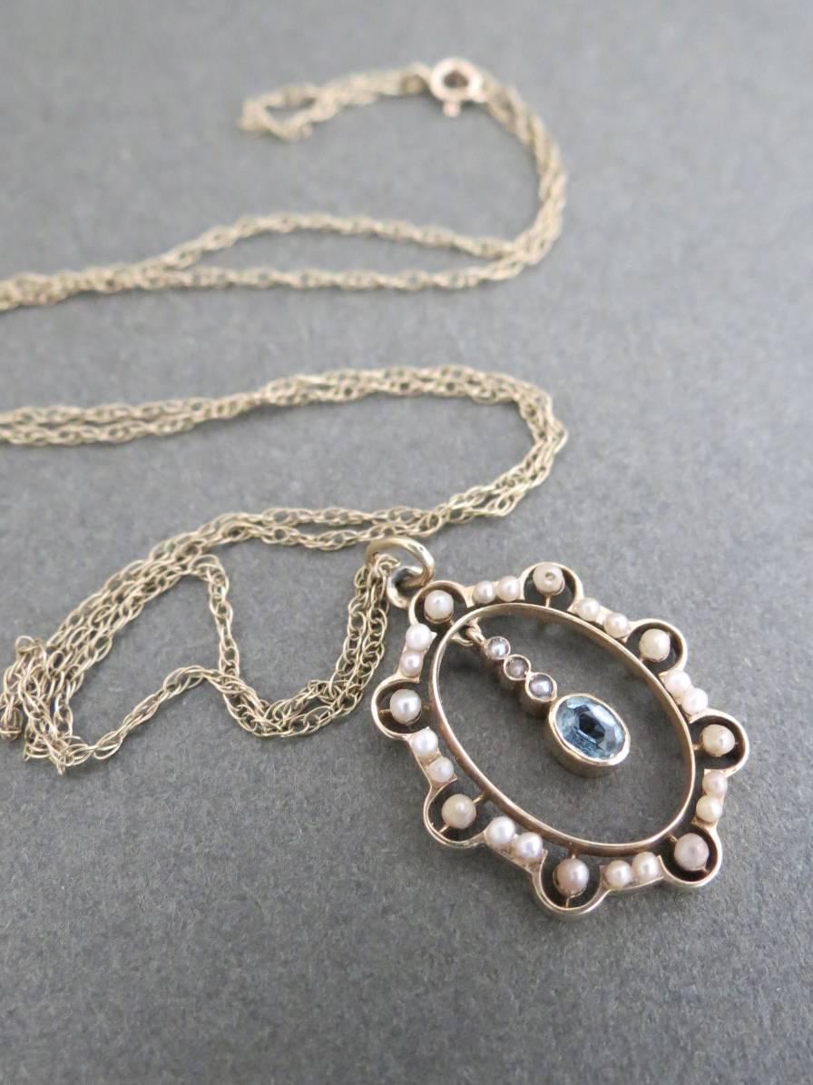 Vintage Victorian 9ct gold seed pearl aquamarine paste pendant and 9ct gold necklace .Some ware on the pearls and gold, necklace hallmarked, pendant tested
Item Specifics
Length: 46cm (approx 18.00