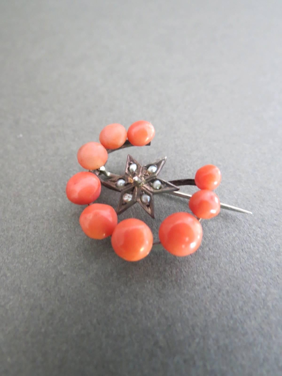 Vintage Victorian Sterling Silver Salmon Coral Seed Pearl Crescent Moon Star Brooch.
Item Specifics
Height: 2.6cm (approx 1.00