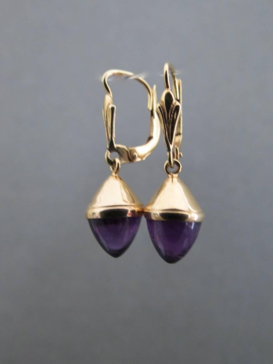 This vintage set of 14k Gold amethyst earrings would be lovely addition to your collection.
Item Specifics
Height: 2.4cm (approx 1.00