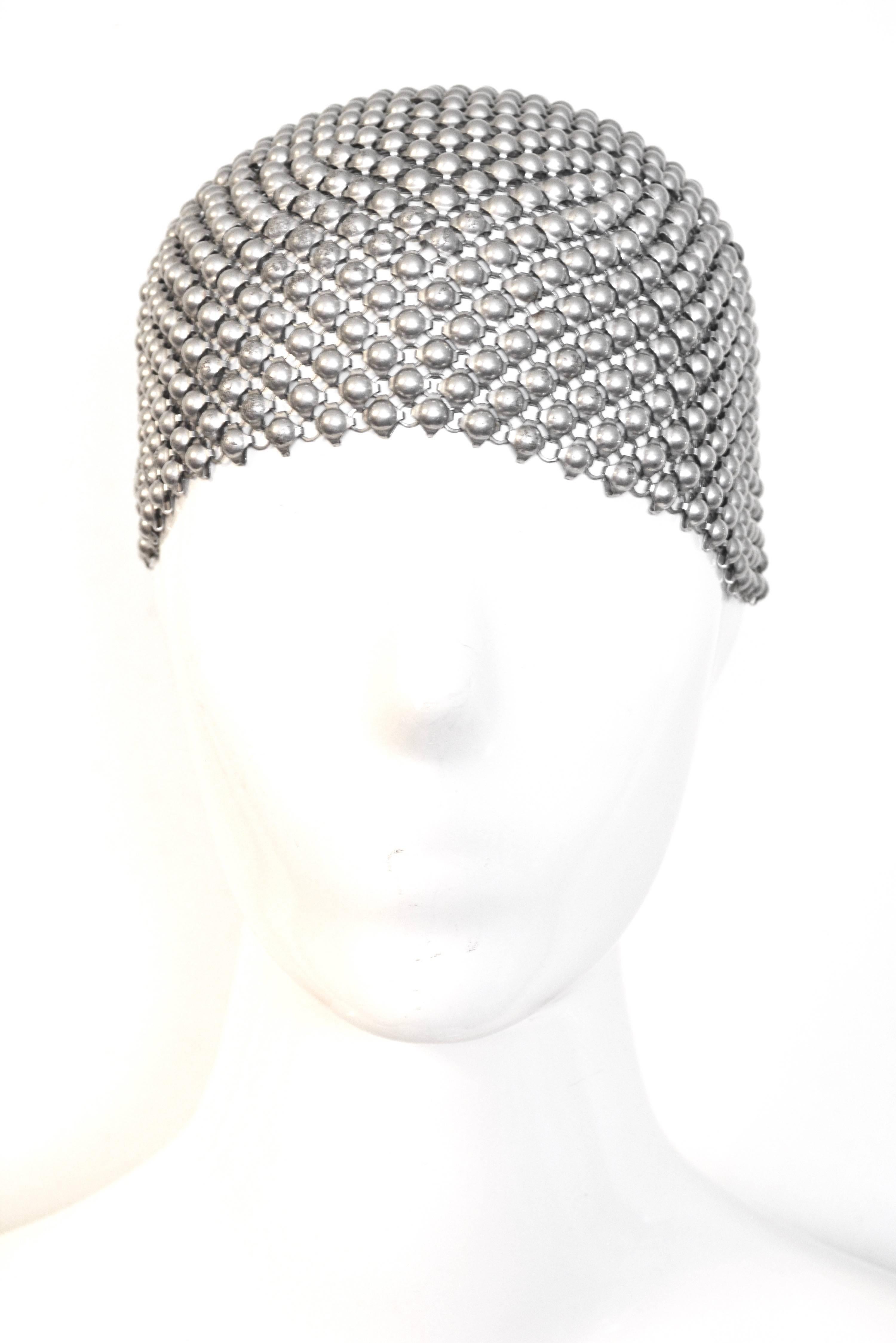 Unsigned mesh aluminum or lighter metal cap or hat that will fit a head circumference of about 20-21