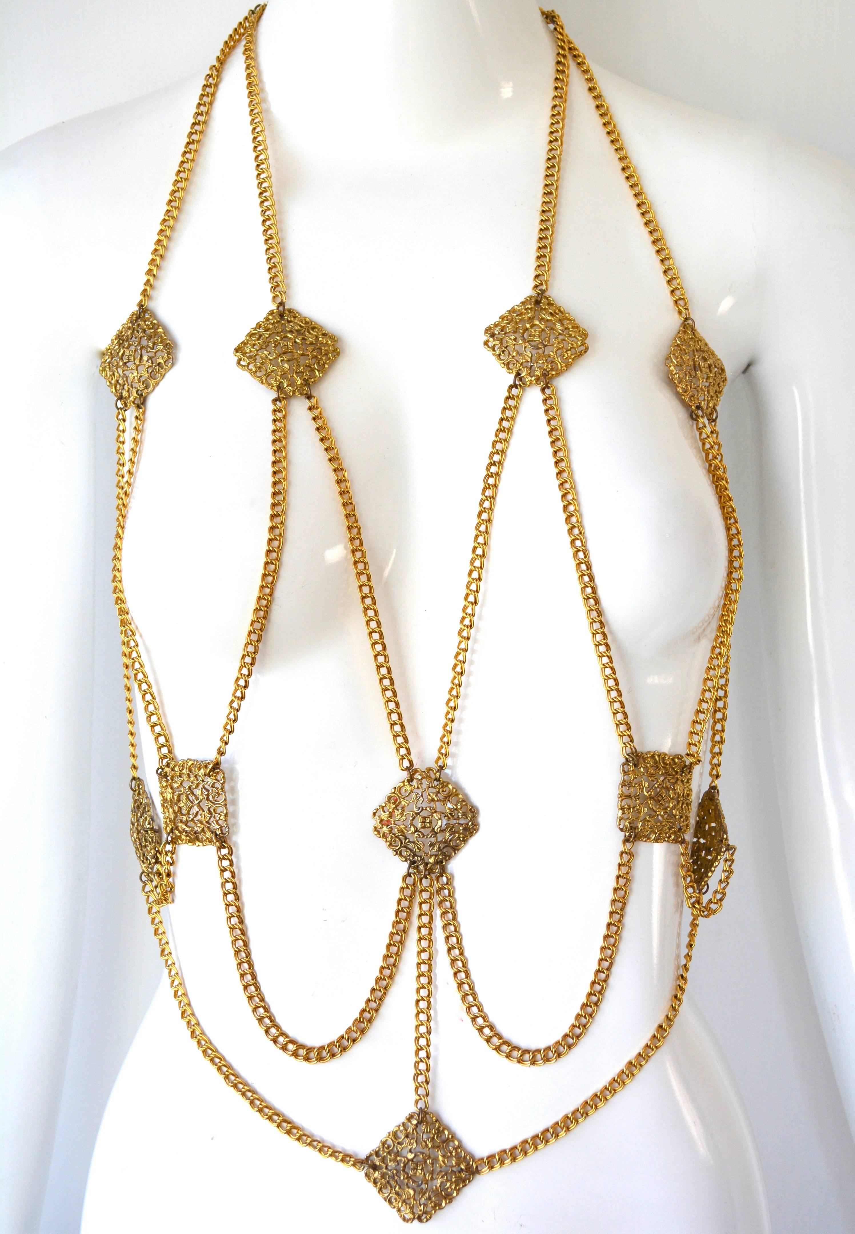 Unsigned 1960s Medieval revival filigree style linked body halter or chain. Golden finish. Very good condition with minimal finish wear. Hook closure, one size. Can be worn in two different ways as seen.  