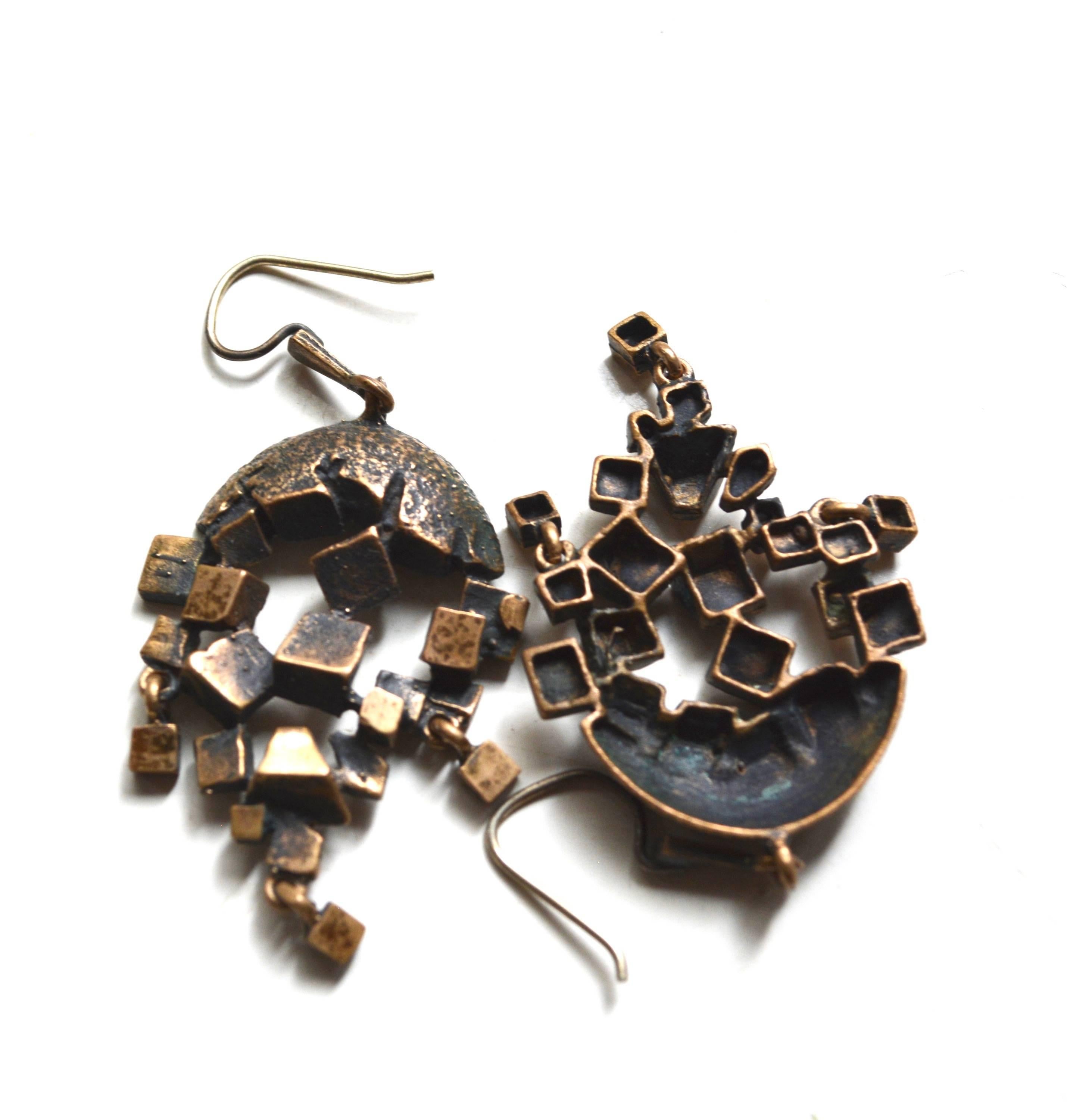 60s-70s Brutalist cube style earrings. In the style of Gilles Vidal, unsigned. Great scale and dimension.  Counting the hooks the length is about 2.5. The cube design is about 1.5