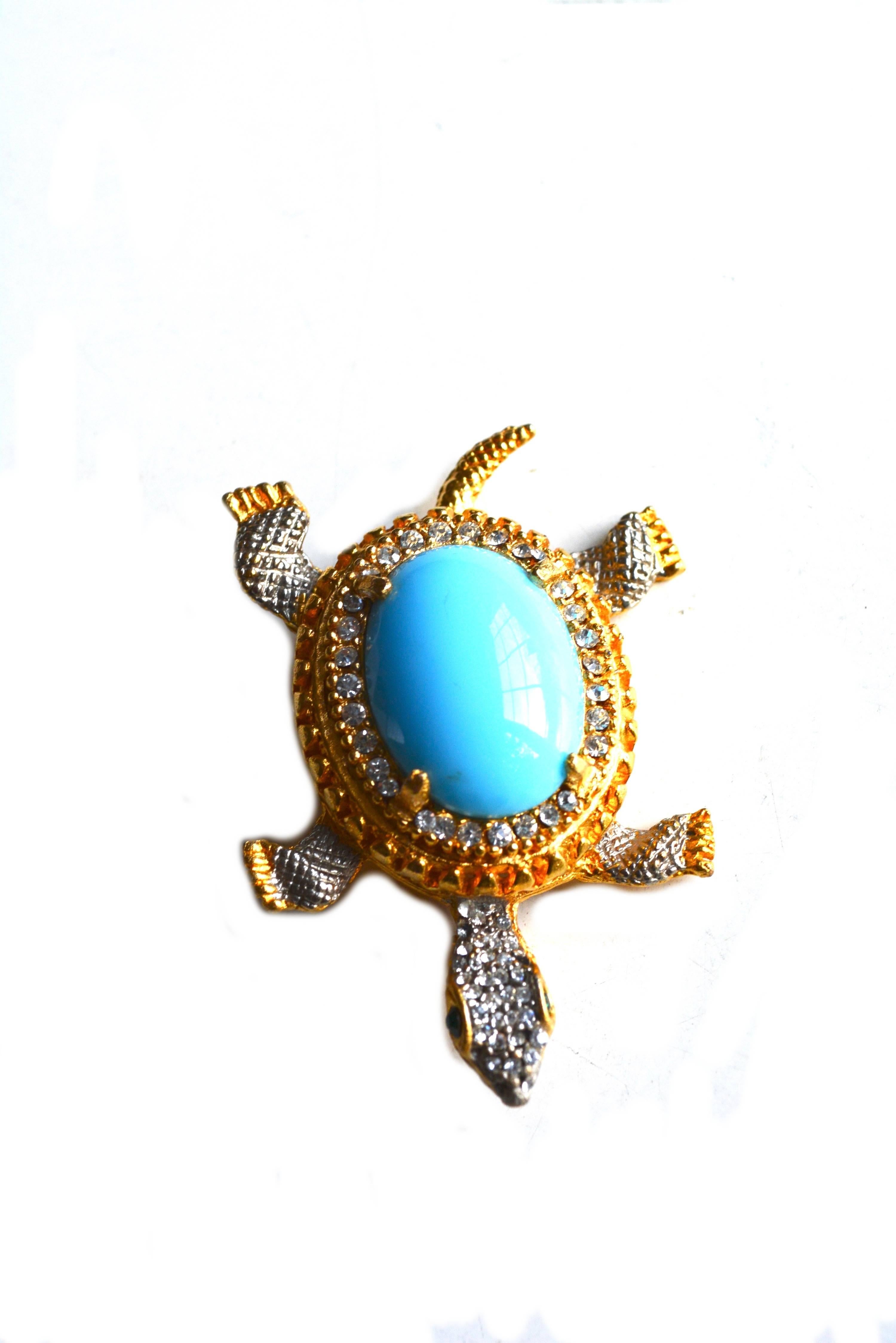 Turquoise lucite turtle brooch, circa 1960s. Signed K.J.L.  2.5" long x 2" wide. 
