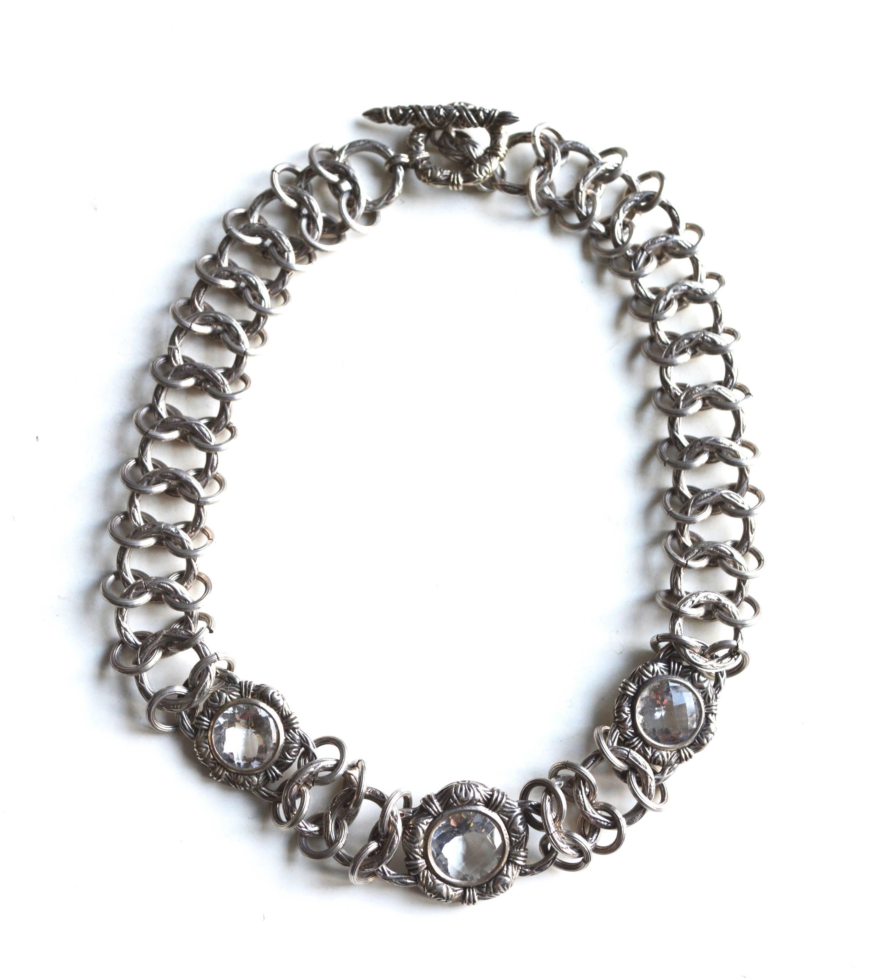 Signed Stephen Dweck stone and sterling link necklace and bracelet. The collar is 15" long and the bracelet is 7" long. The link design is intricate and well designed featuring an oversized mesh style design. 