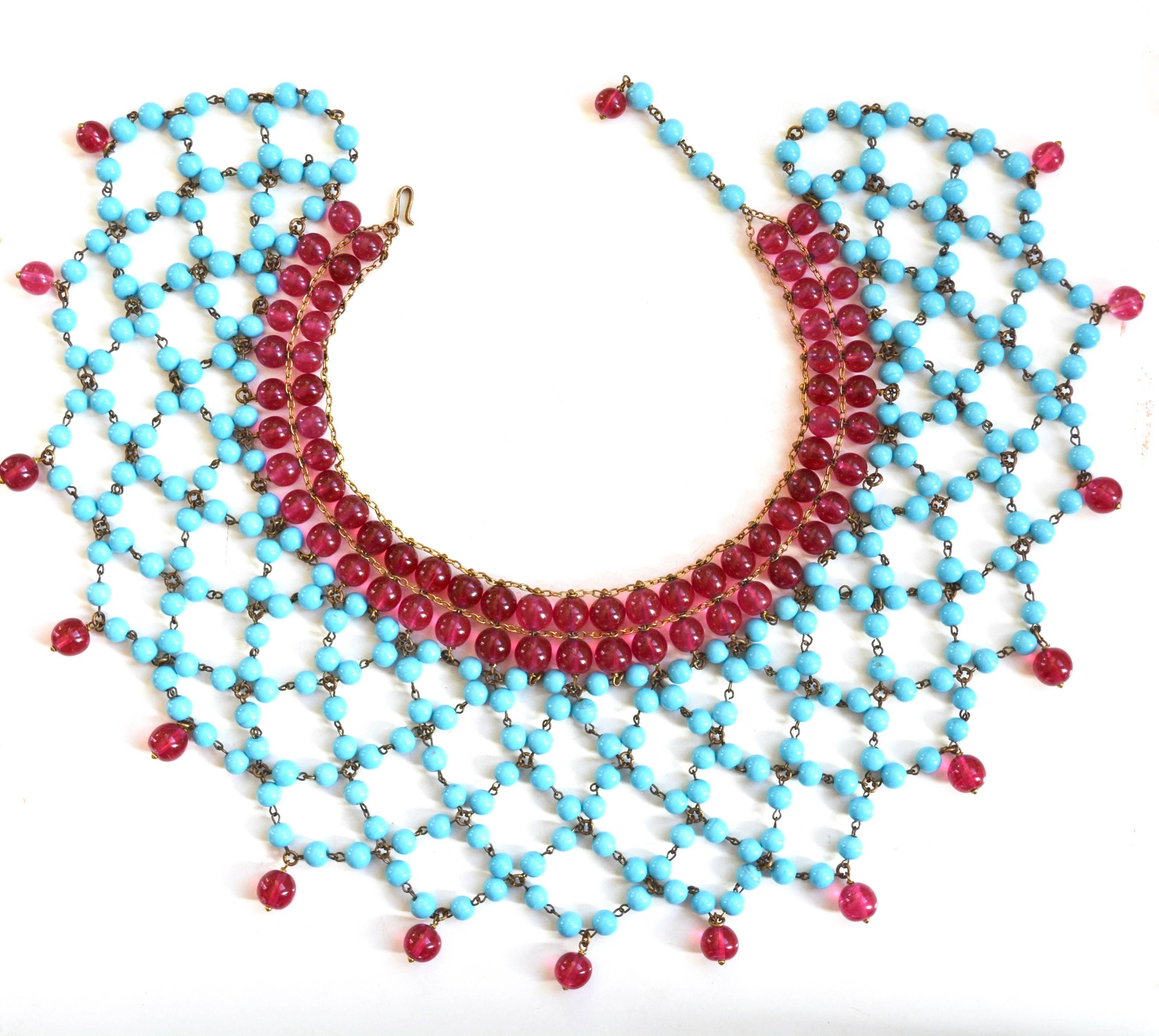 Beautiful turquoise blue and berry red Gripoix for Chanel necklace. Signed France on the hook. Confirmed to be earlier Gripoix by that maker. Dating to the beginning of the 1950s, before pieces were signed by Chanel. It is possibly an earlier piece