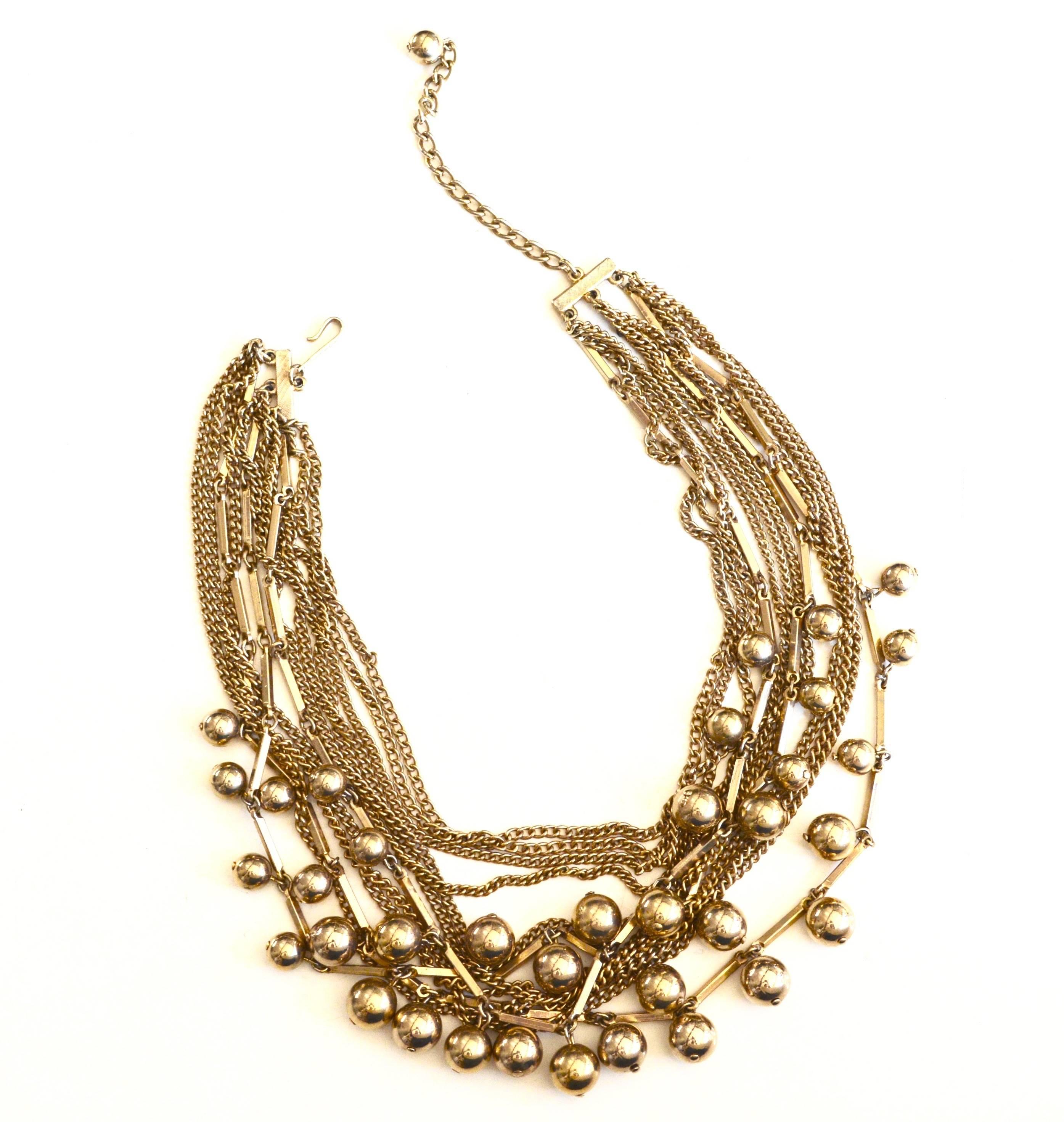 1950s matte gold multilayer signed Coro necklace with ball charms or beads. Finish is muted but intact. Lovely textured look and feel.  Adjusts up to 16