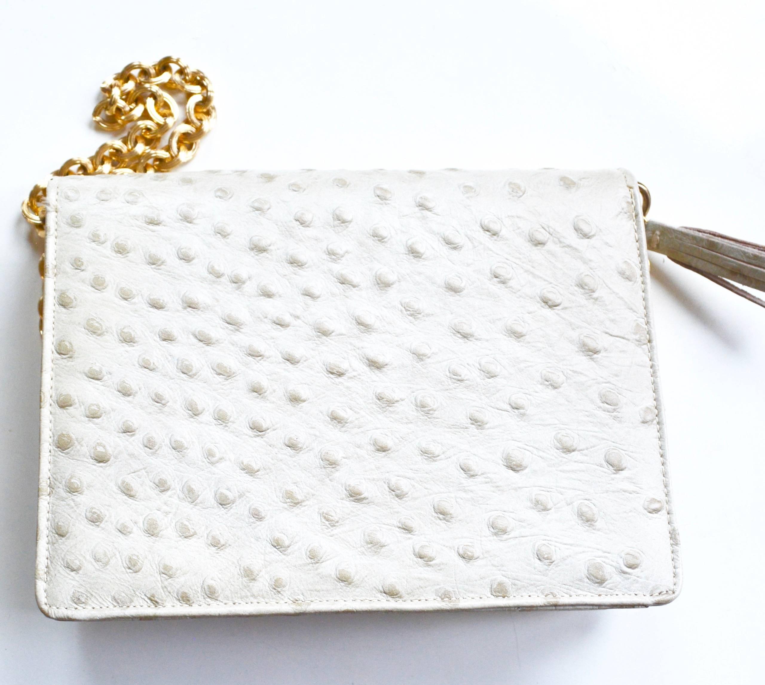 Wonderful quality Dofan beige ostrich 1960s bag with convertible clutch chain removal option. The size is great as well. Condition is very good. 
7.25