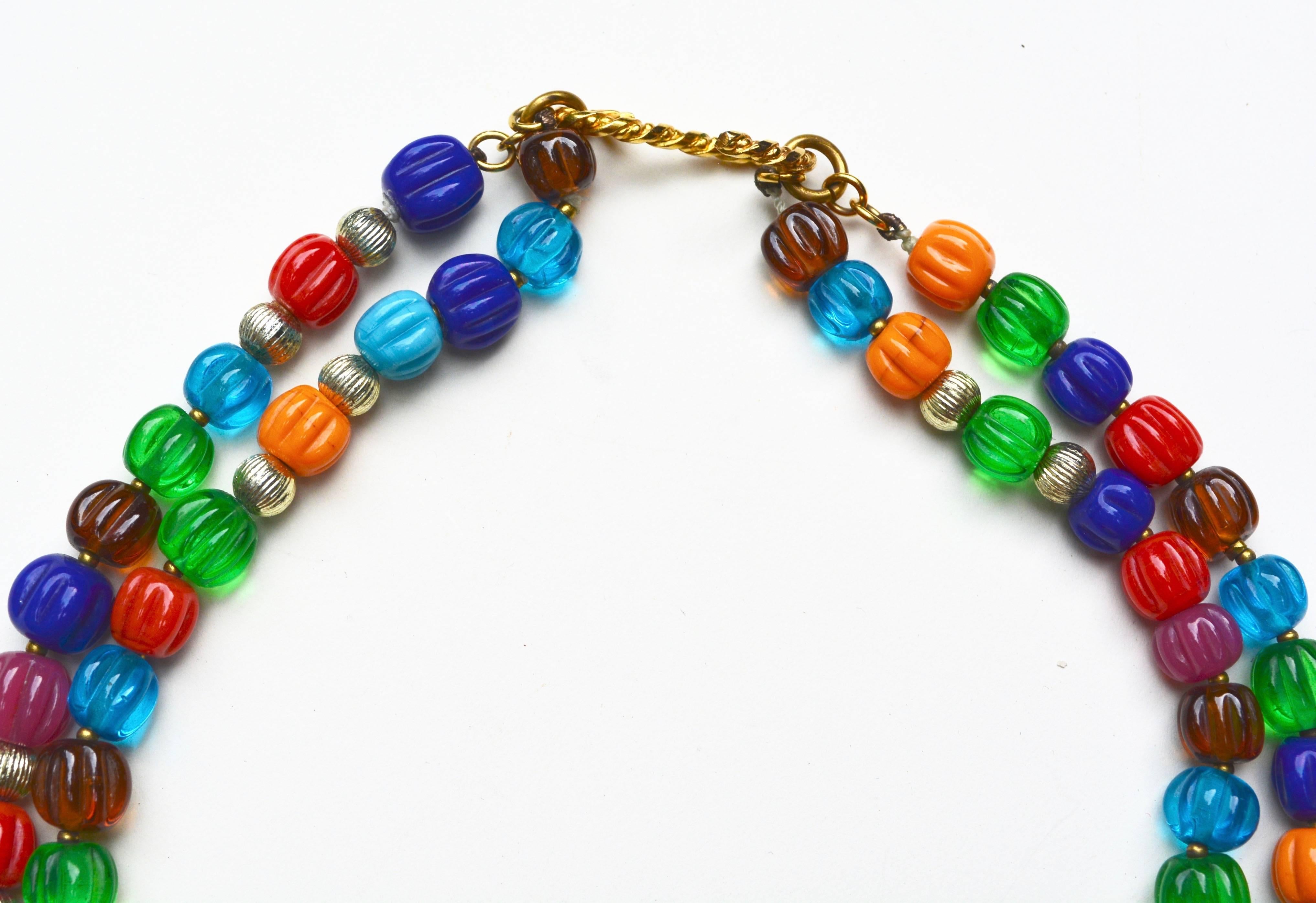 Circa 1950s-60s unsigned Chanel gripoix glass necklace. The clasp is one I have seen on others from this period. The beads have a node to French mellon style deco beads. This Chanel clasp style is similar to that featured in the Bijoux de Couture