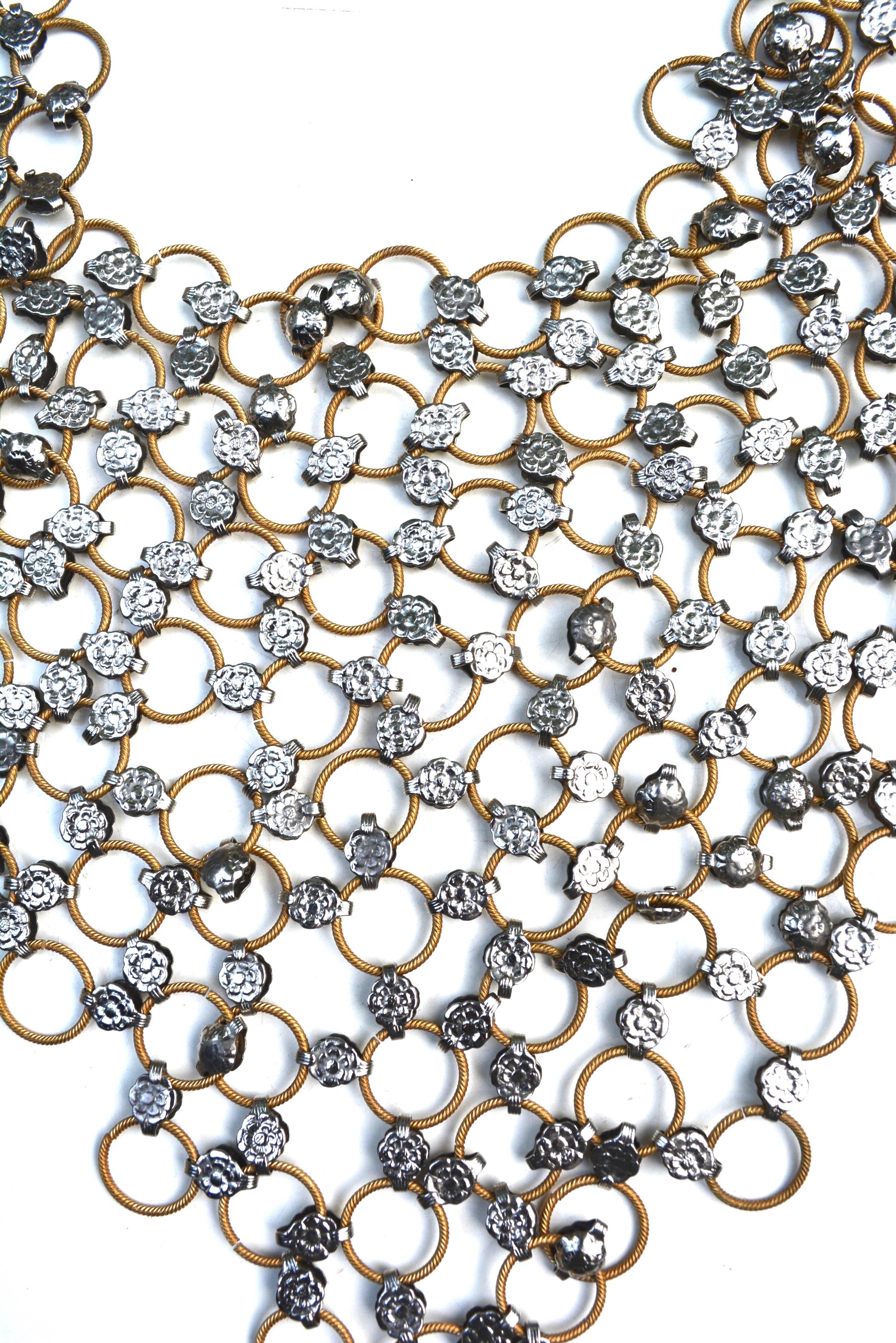Unique 1960s multi tone chain mail or armor style 18" adjustable by 9" long necklace and matching long earrings. A stunner of a set with an edge. It has a movement which is fluid and not static. Paco style in some ways and really captures