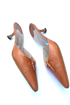 Manolo Blahnik Saddle toned leather Heel