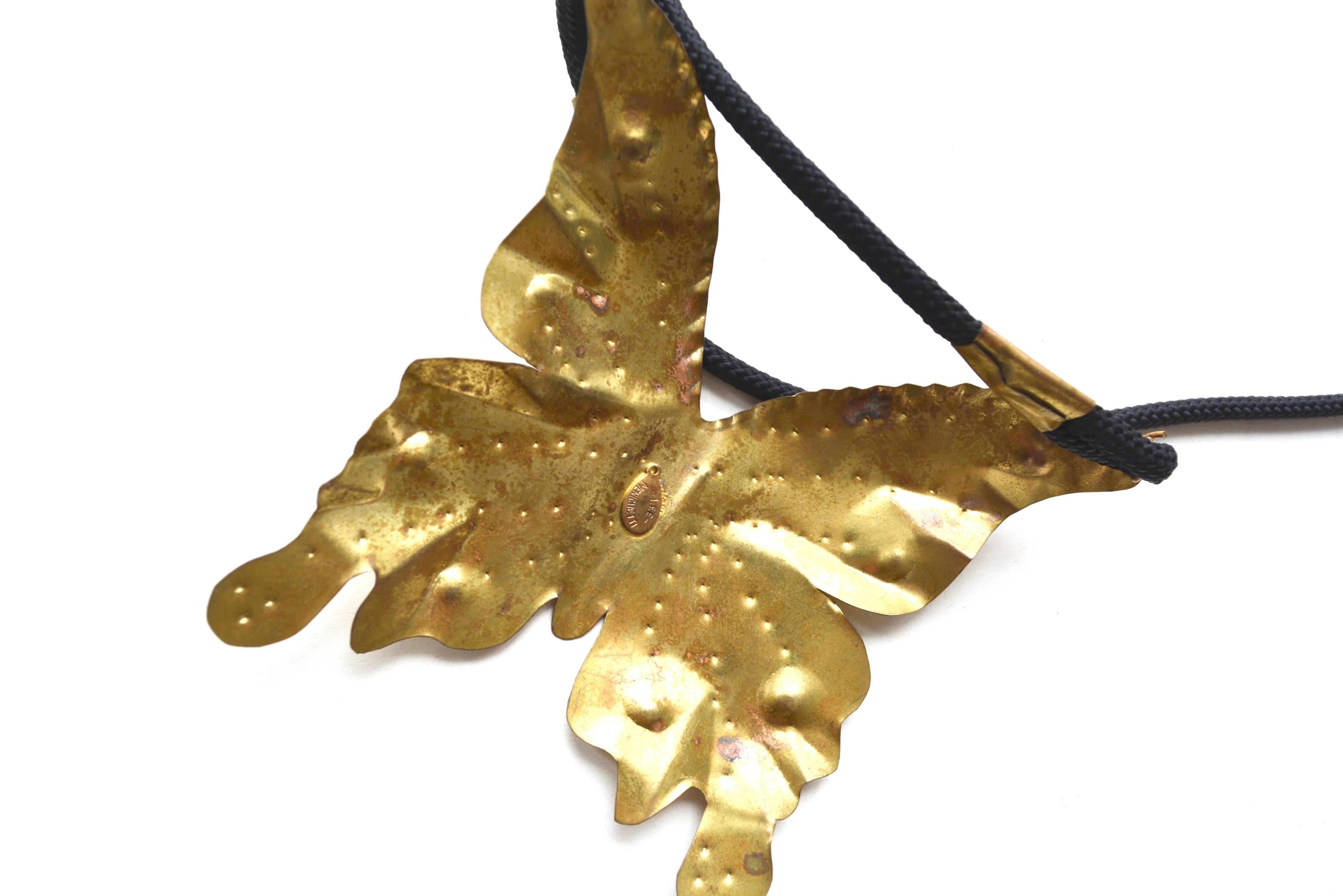 Vintage handmade brass butterfly necklace, signed Lee Menichetti.  4" long x 3.5"wide.  30" long. 