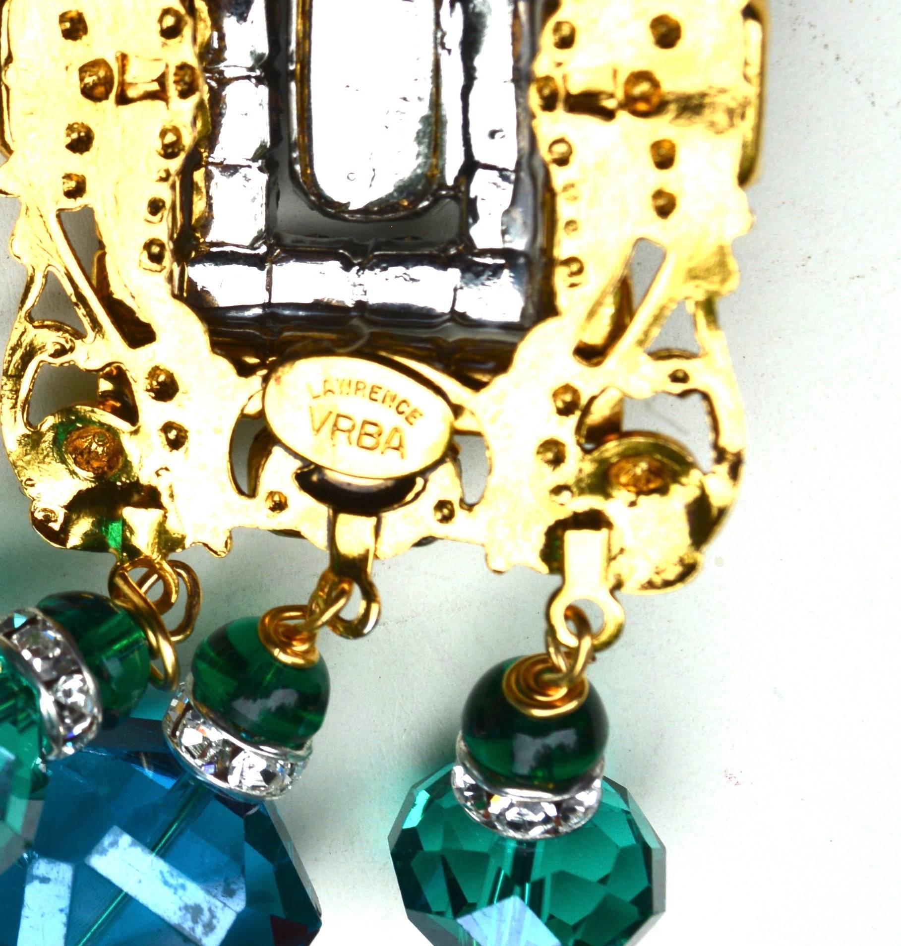 Glass Emerald and gilt metal filigree earrings in an oversized style. Handmade with lots of detail, signed. One bottom stone is set a bit off due to hand made aspects. 4.5