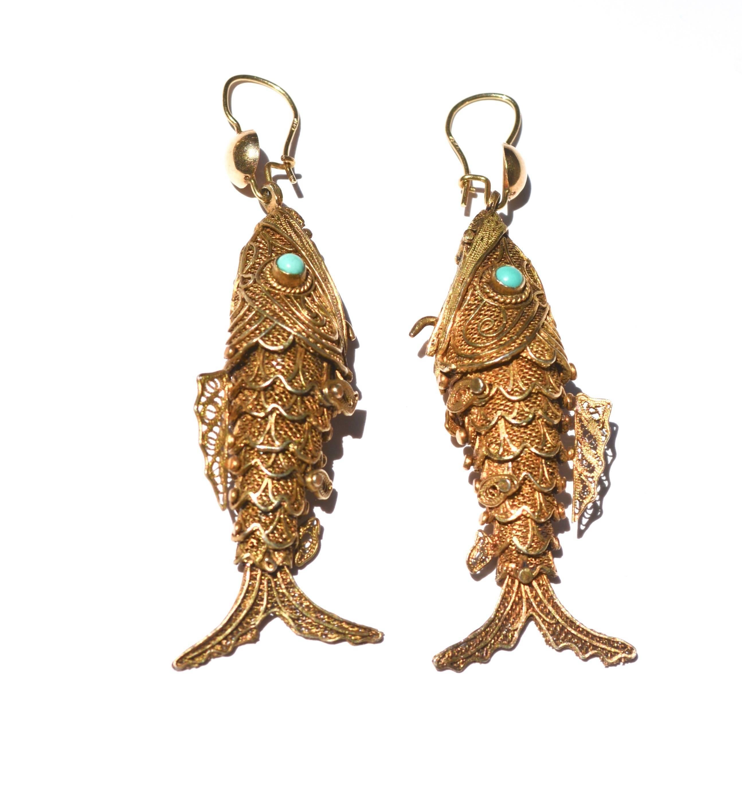 Vintage Chinese fish earrings with marked 14k ear hooks. Opening mouths function, excellent except one fish is missing a tiny side fin.  Total length with hooks is about 2.5