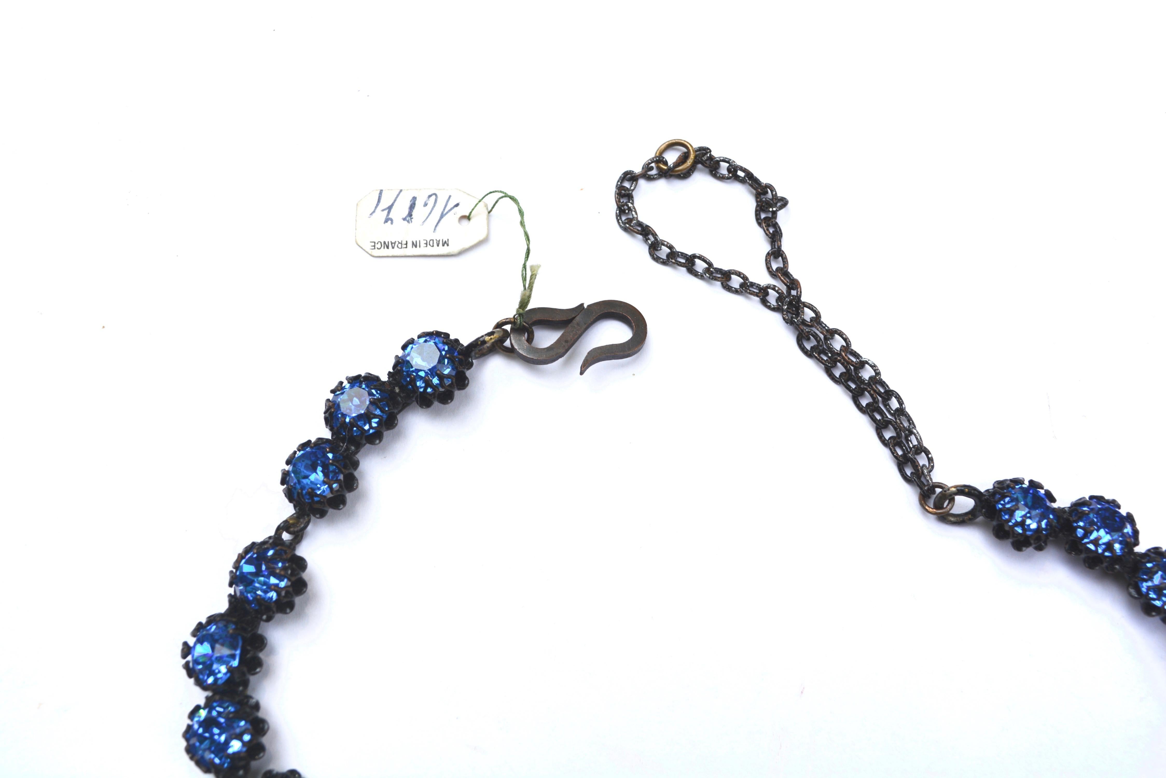 Pretty blue and pearl necklace, with tell tale signs of Dior like the clasp and setting style. Made in France tag still on the original necklace.  Possibly by Francis Winter for Dior as he used this style. Unmarked except for the tag but this isn't