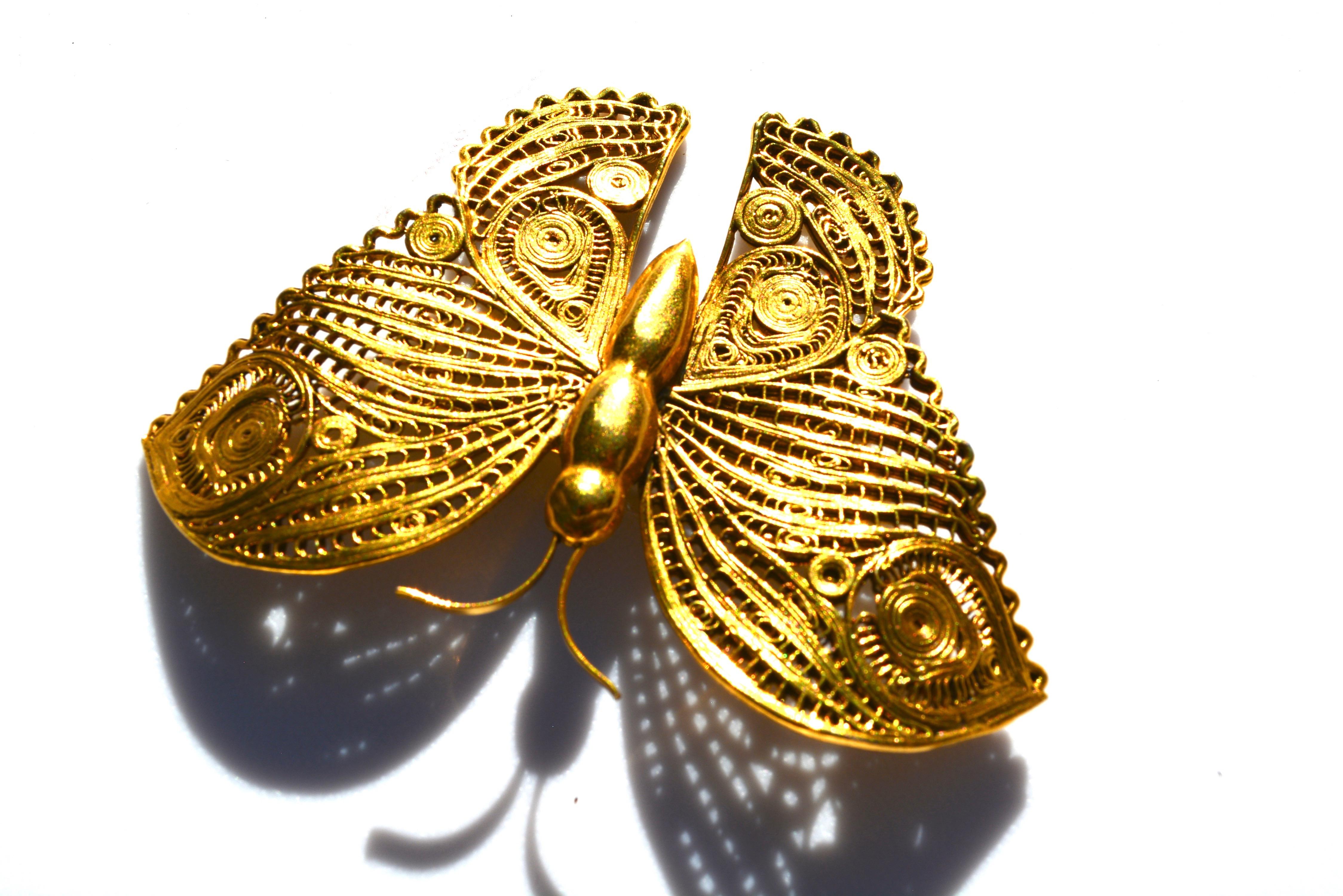 1970s butterfly brooch. Oversized, brass and gilt finish. Not signed. 3.5