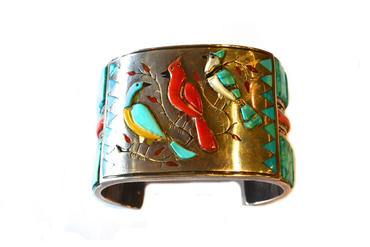 Stunning inlay mother of pearl, coral and turquoise sterling cuff. Signed W. Spencer. Old pawn acquisition.  This piece is from a major important collection, which held artist made examples such as Jesse Monongya. The cuff is substancial and quality