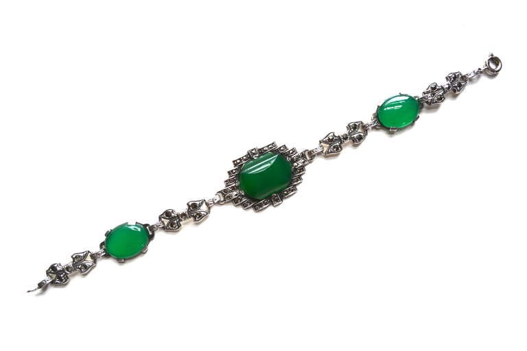 Art Deco marcasite and chrysoprase stone bracelet set in sterling, marked. Artist unknown.  The stones are all original and in wonderful condition.  The color is so lush. Center link is about .75