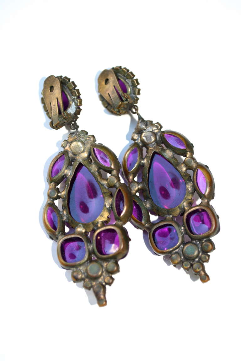 Early signed K.J.L violet cluster cocktail hour chandelier earrings with lucite (possibly poured glass) and rhinestone details. Antiqued metal details/settings.  The shape and size are gorgeous and the weight is perfect, not to heavy. The color