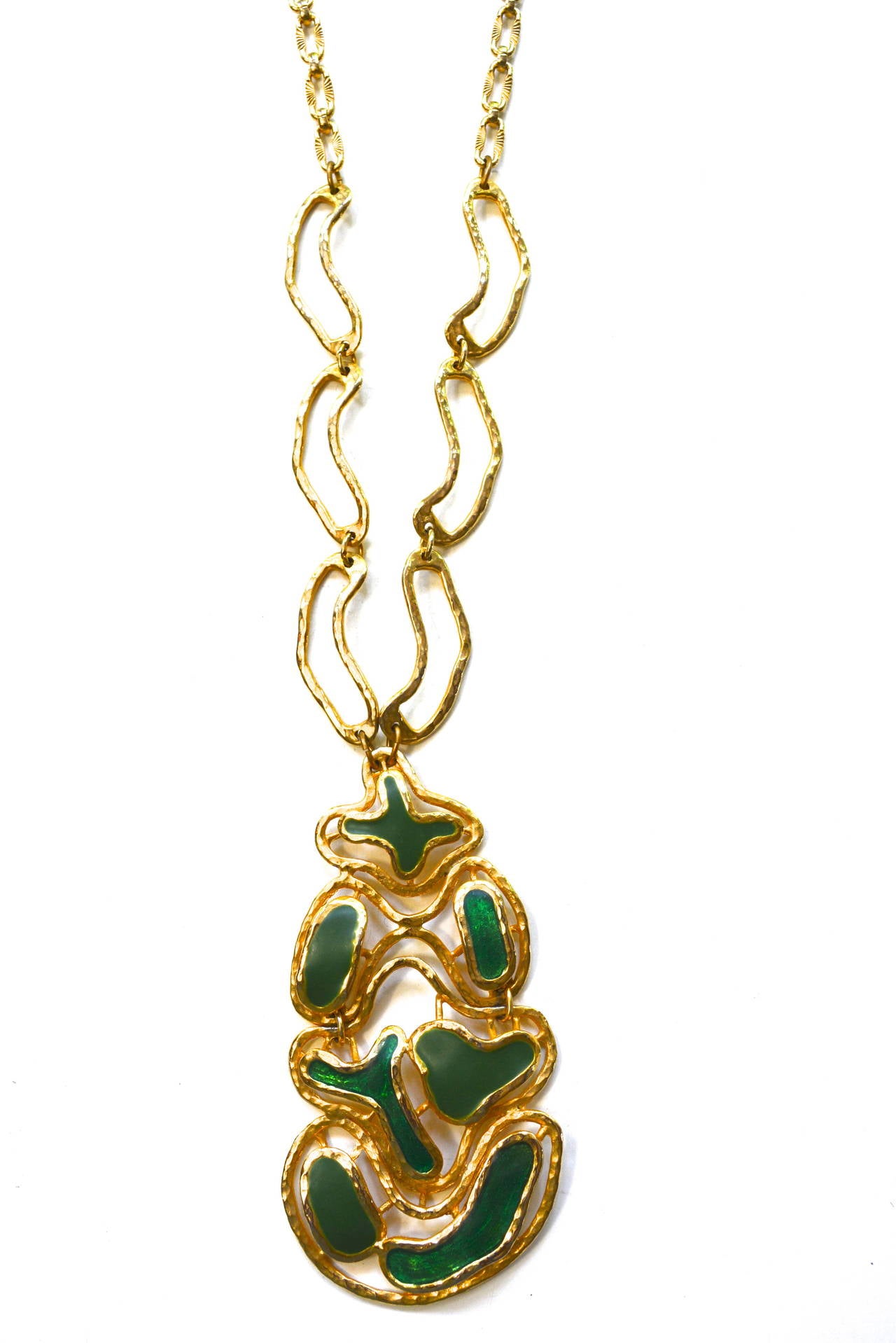 Circa 1960s-70s large green enamel and poured resin pendant with golden metal chunky chain links. The piece is unsigned but has a great look and feel. The chain width varies at .5