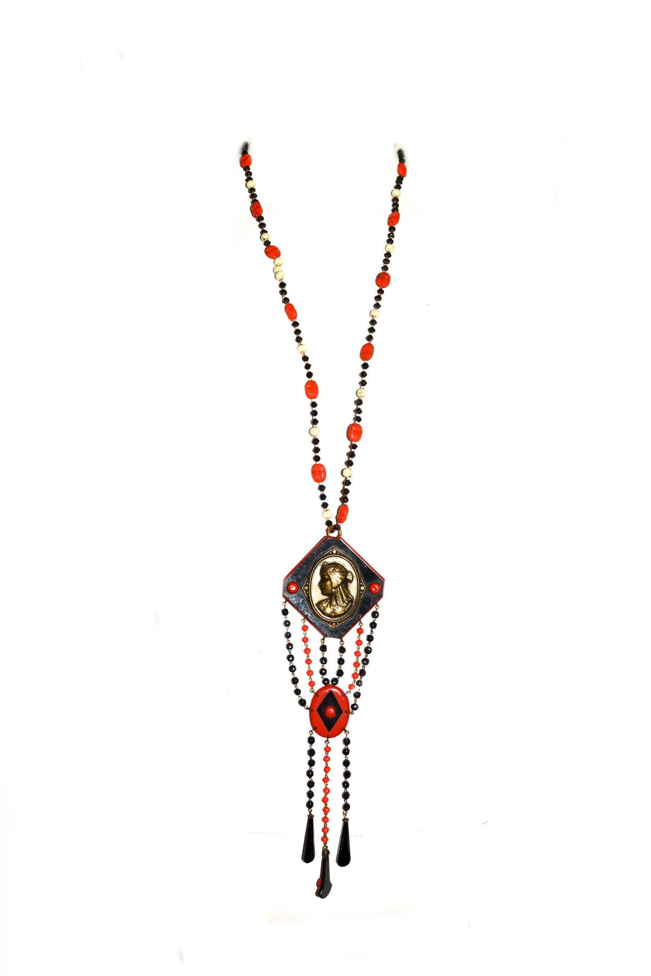 Art deco black, red, and white czech glass Egyptian revival necklace, unsigned. From a larger lifelong Egyptian revival jewelry collection. I believe the scarab necklace is by Max Neiger. The large piece seem to be originally a belt buckle which