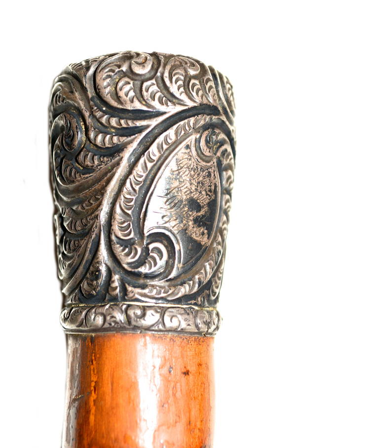 1890s sterling Victorian English engraved presentation cane. This piece has great modern lines and a wonderful feel. It has lived a long life and has a great patina, which I haven’t removed from the silver. Could be polished if desired.  The piece