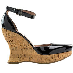 Alaia Black Leather Wedges