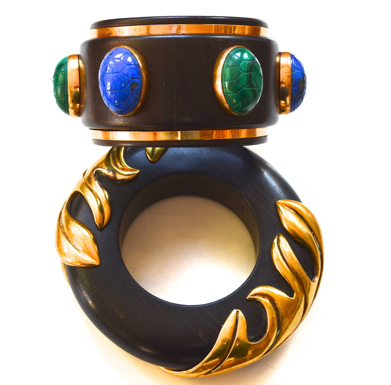 * Will be willing to separate these upon request**
Vintage signed Isabel Canovas cuffs from a collection, circa 1980s. Early desirable limited quantity examples of her work. The large cuff with turtle or scarab precious gemstone cabochons has well