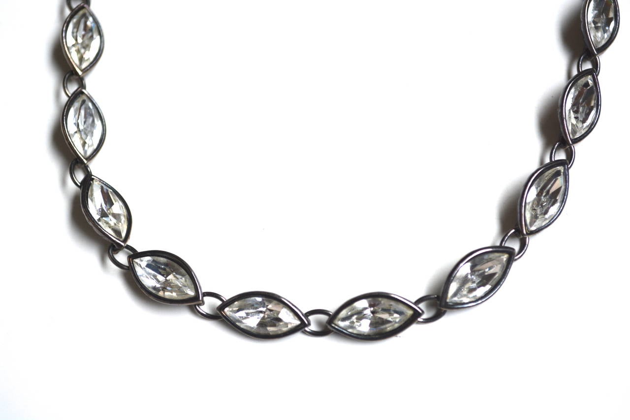 Yves Saint Laurent 1980s cut glass link necklace. Antiqued silver details and signed YSL clasp. Great simple geometric, but pretty design. Adjustable lengths. Total length is 16