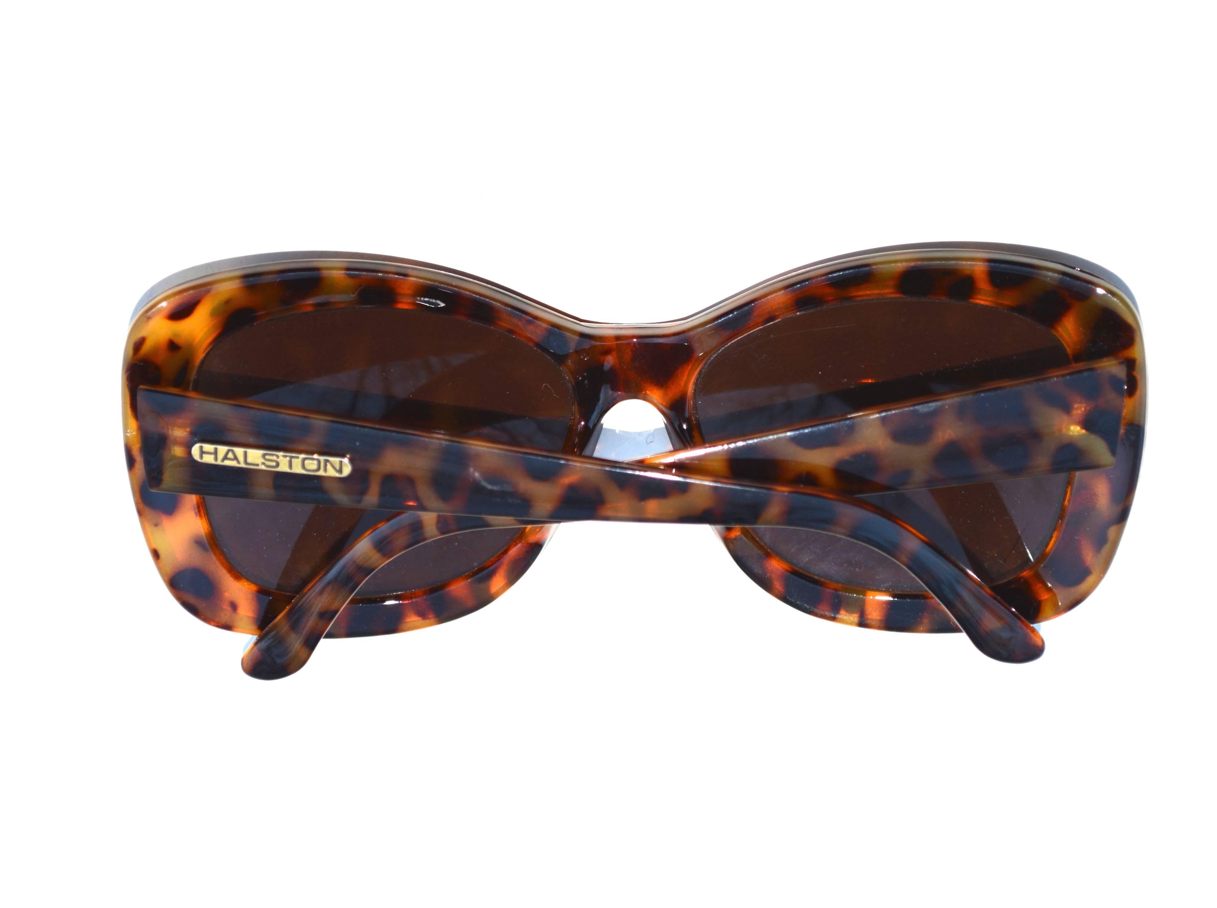 Signed and marked vintage Halston oversized sunglasses with a tortoise finish. The entire face is 6