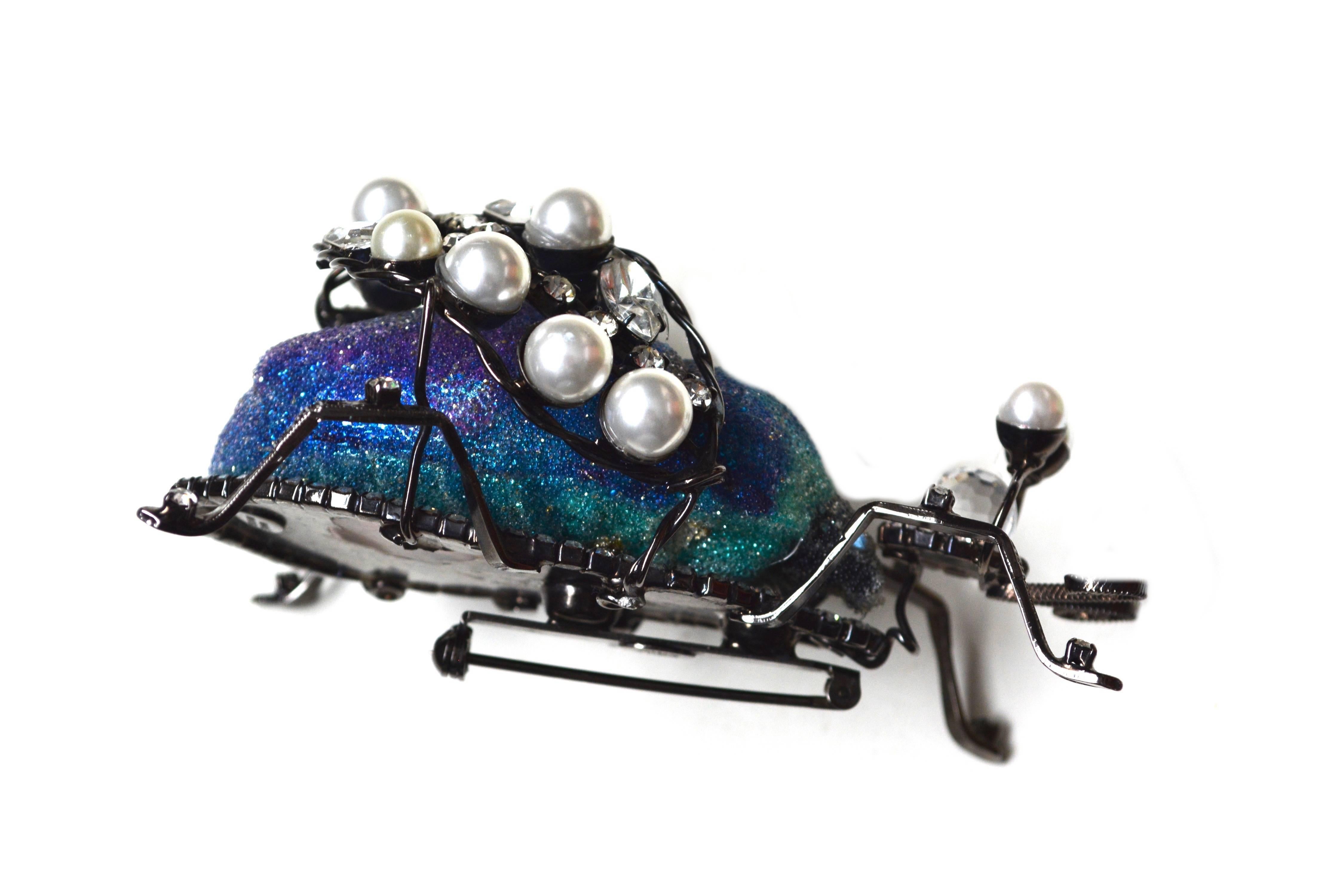 One of a kind Lawrence Vrba signed bug brooch made from a vintage bug ornament. The designer created a few of these bug brooches and each is different and handmade. 