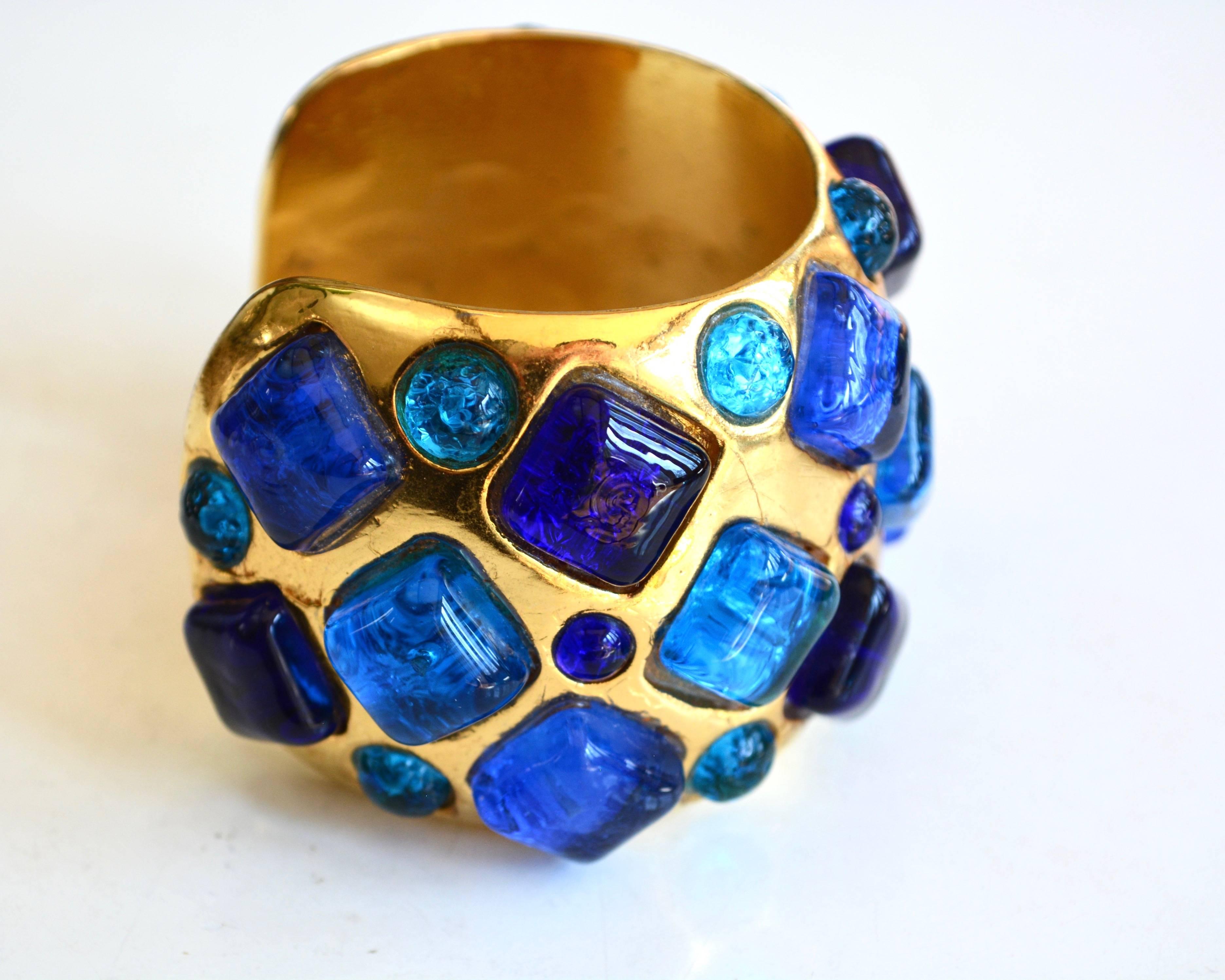 Handmade French designer Gripoix cuff signed Dominique Aurientis. The bracelet appears to be molded and is irregular in some original aspects ( there are some a linear marks in the finish, due to the way it was made.  The colors are rich and the