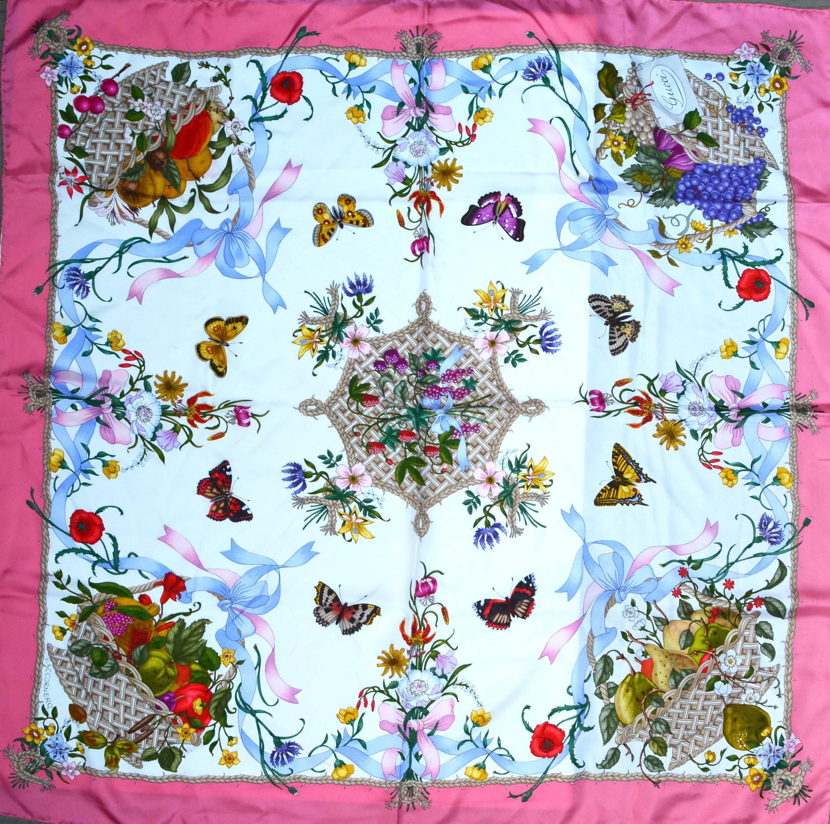 1970s floral and insect adorned 35″ pink and white Gucci scarf. Good condition with mild wear as seen in the picture. Clean overall. Hand rolled silk. Vibrant colors. Signed V.A. CCORNERO and marked Gucci.