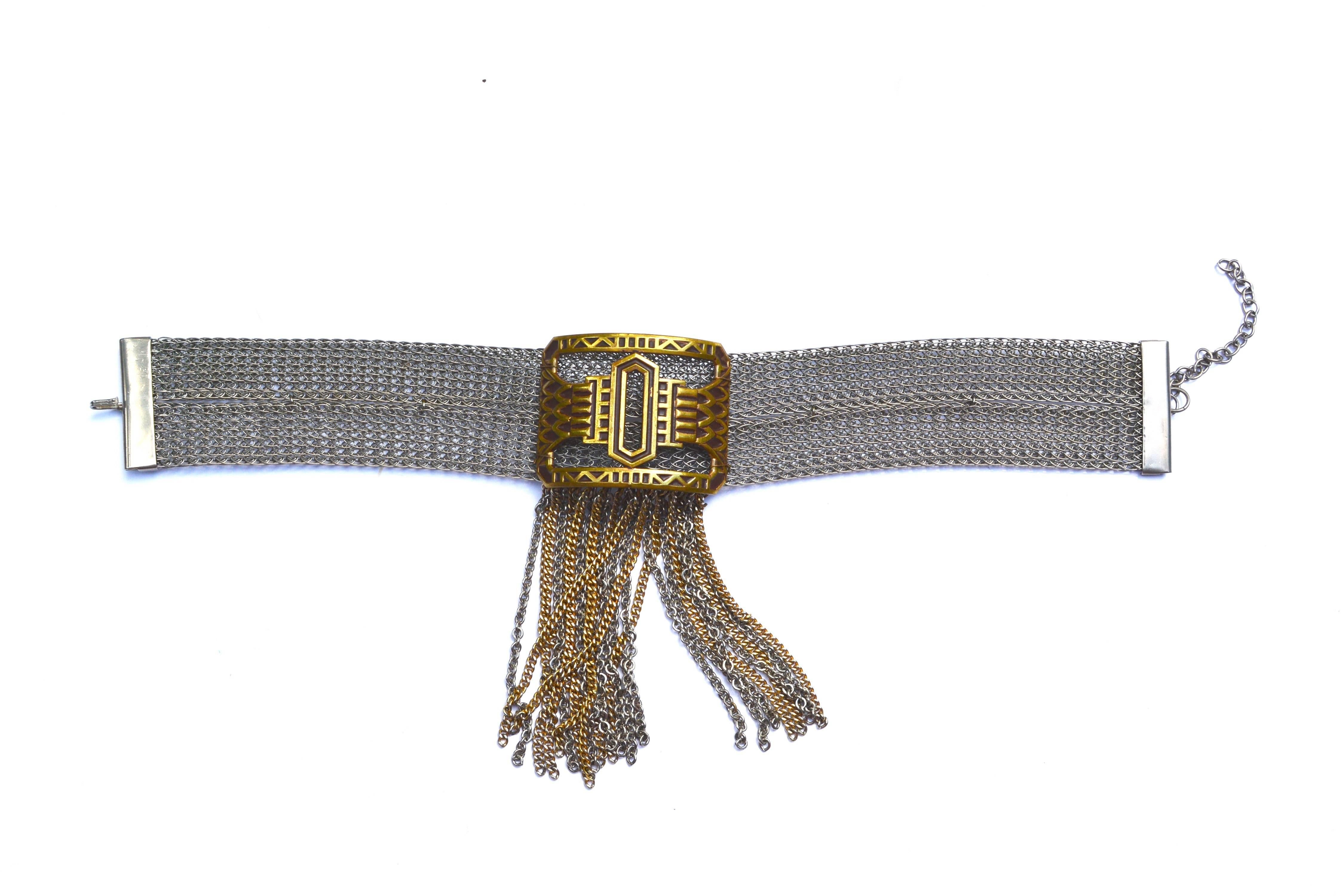Sandor co deco revival necklace. The company started in 1938 and closed in the early 1970s, so pieces are hard to find. Mesh style choker with signature and deco style enamel buckle and chain fringe. Adjusts up to 15" long x about 1.5"