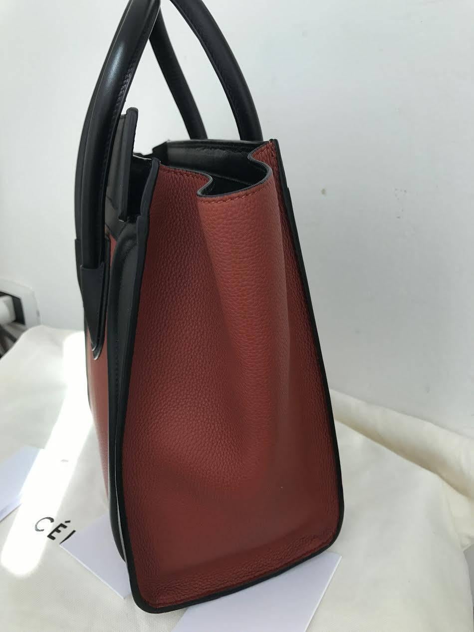celine luggage bag micro
brick red and black
cm. 26 x 26
GRAINED CALFSKIN