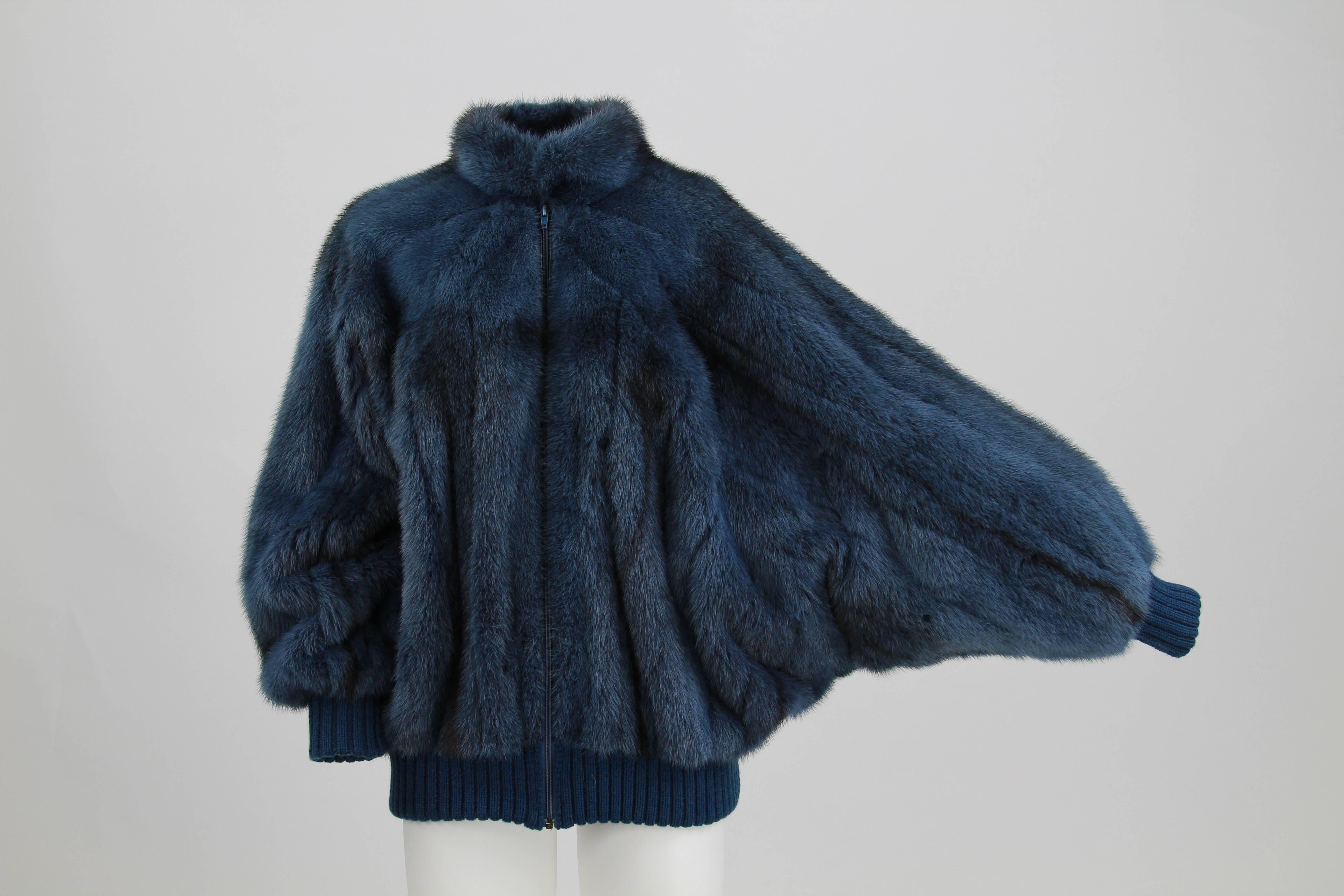 Iconic and handmade black cross male mink fur by Christian Dior, featuring a sporty style, wide sleeves and wool cuffs. 
Designed by Gianfranco Ferré and made in France, the fur dates back to late 1980s and is in excellent conditions.
Size: M
