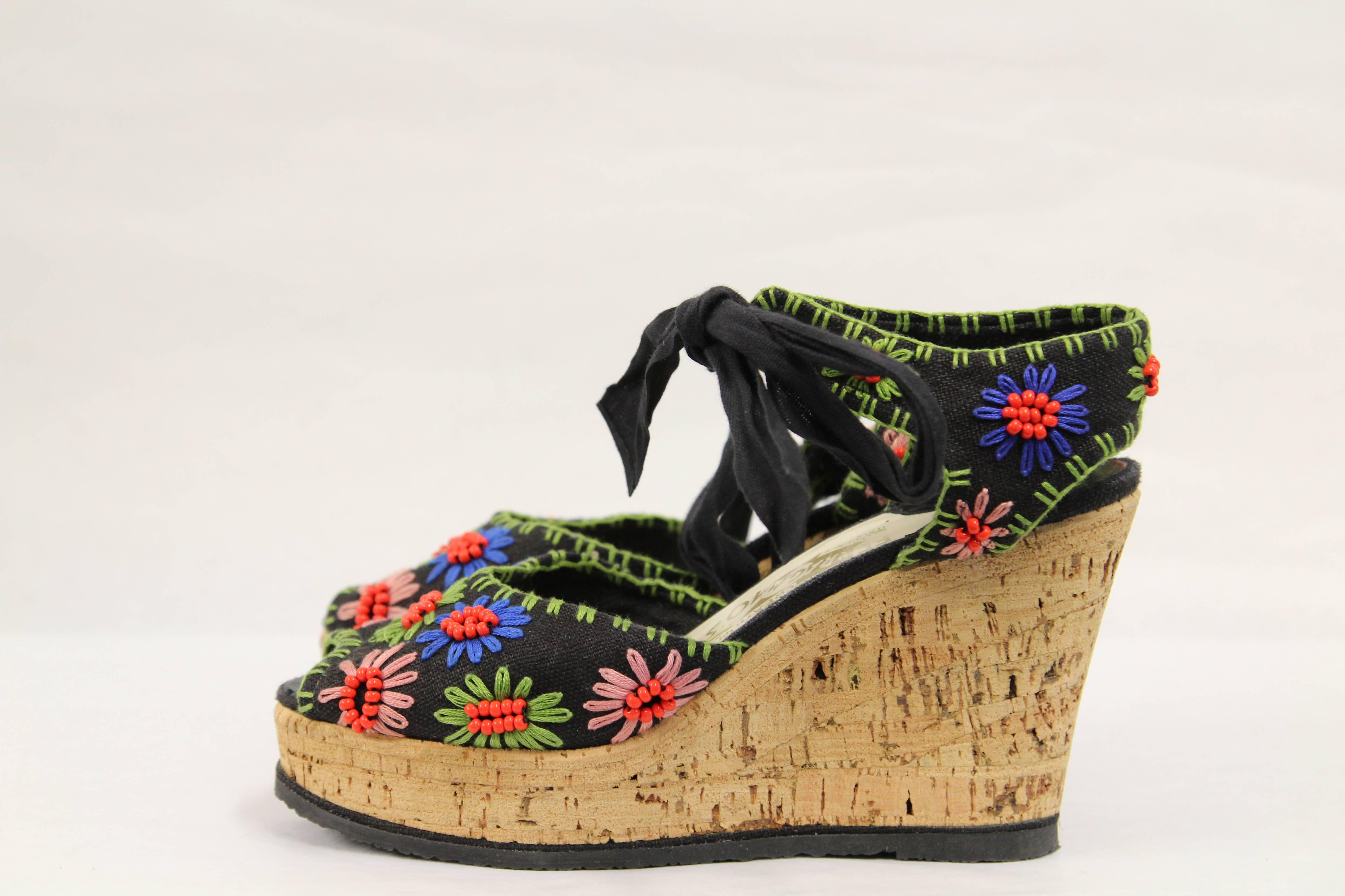 Beautiful Limited Edition embroidered wedges sandals by Salvatore Ferragamo. The item has never been worn, it is though in perfect conditions. The wedge measures 9 cm.
It dates back to 1970s. 
Size 37 EU: the item fits half size smaller.